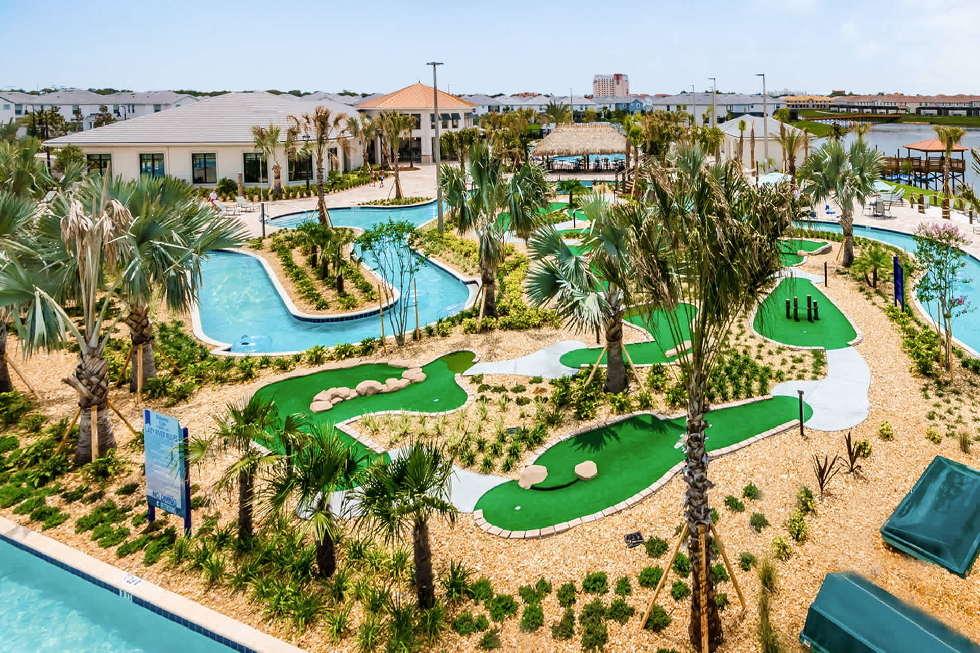 Enjoy A Round Of Mini Golf Surrounded By Lush Greenery