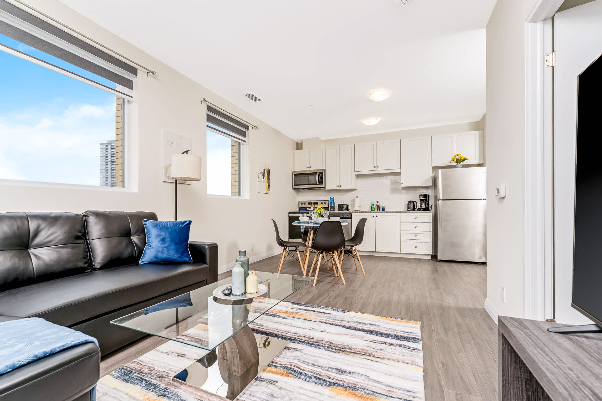 Modern High Rise Condo w Private Patio Downtown 2