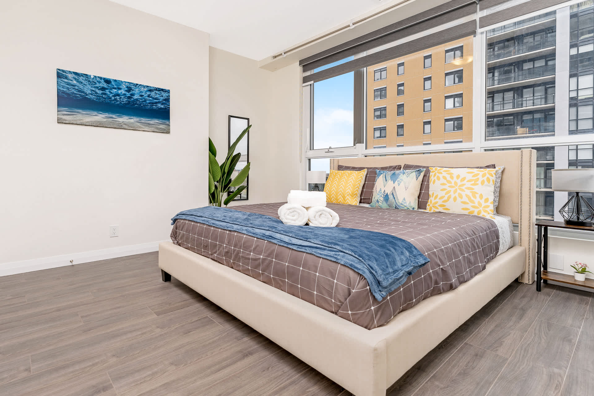 Modern High Rise Condo w Private Patio Downtown 3