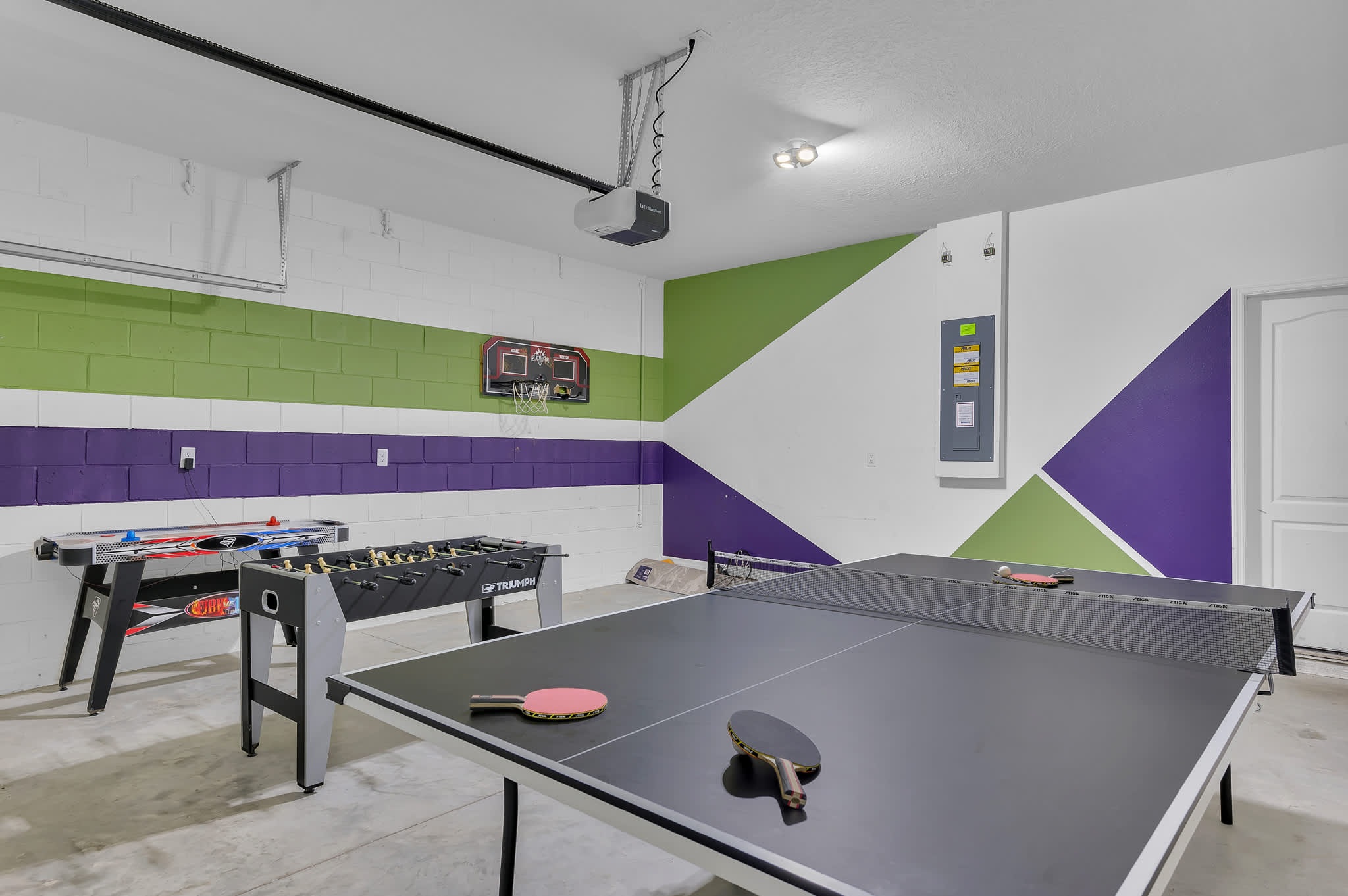 Game Room with Air Hockey, Foosball, ping pong and a place to shoot some hoops!