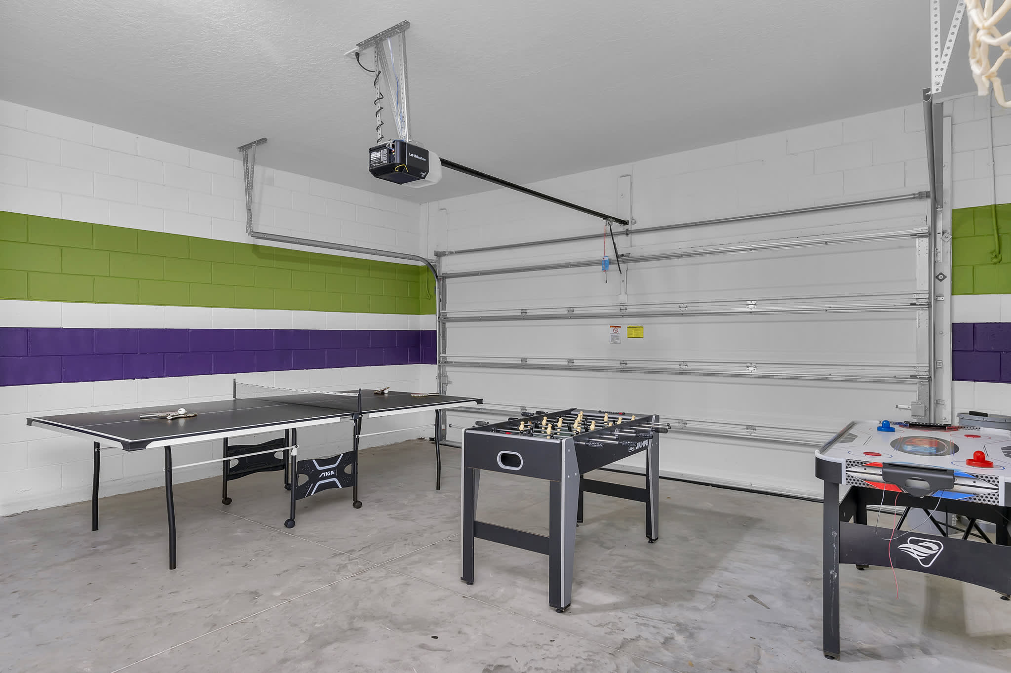 Game room with ping pong, foosball, air hockey...we even have an area to shoot some hoops!