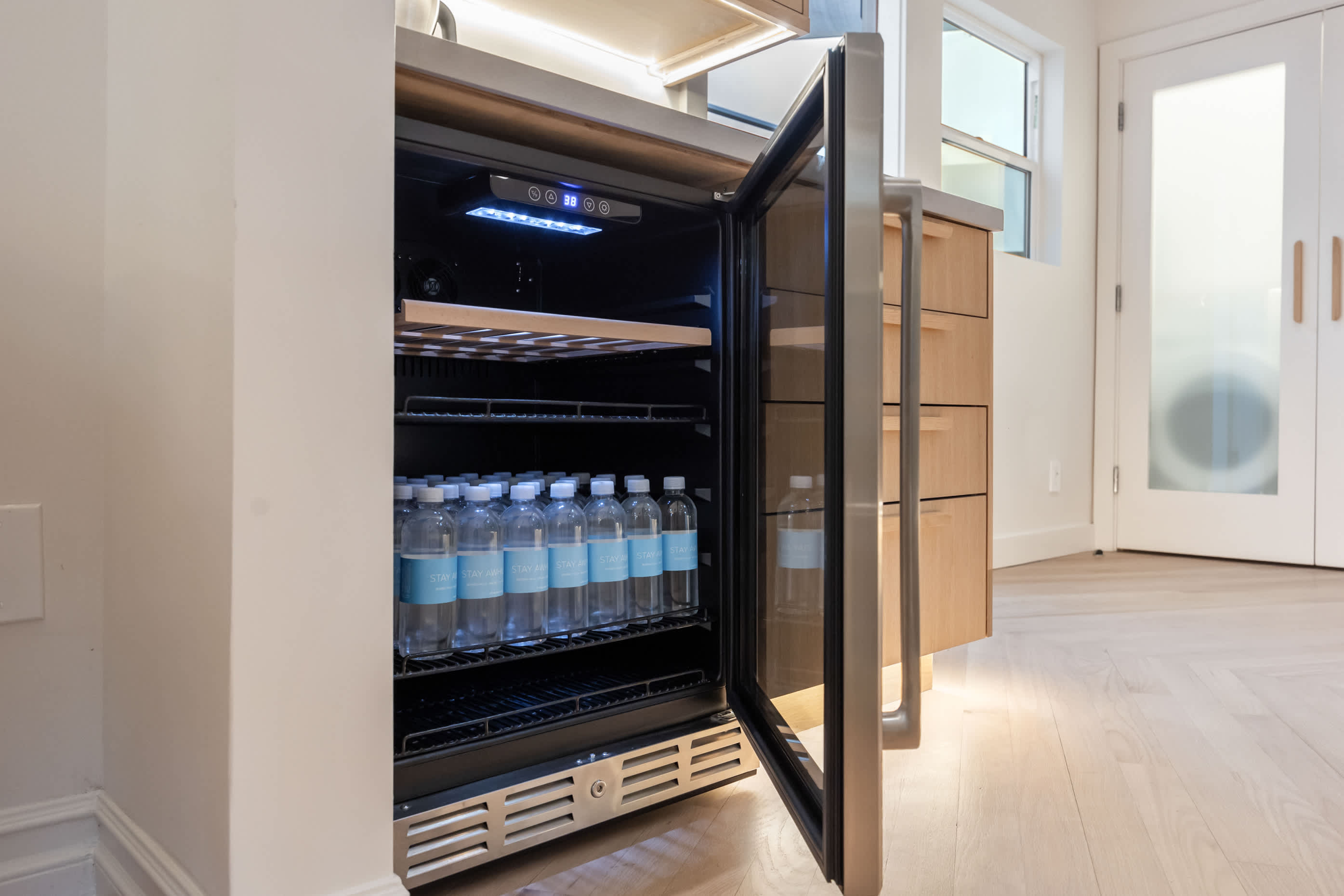 Stay refreshed with a fully stocked beverage fridge, ready for every moment.