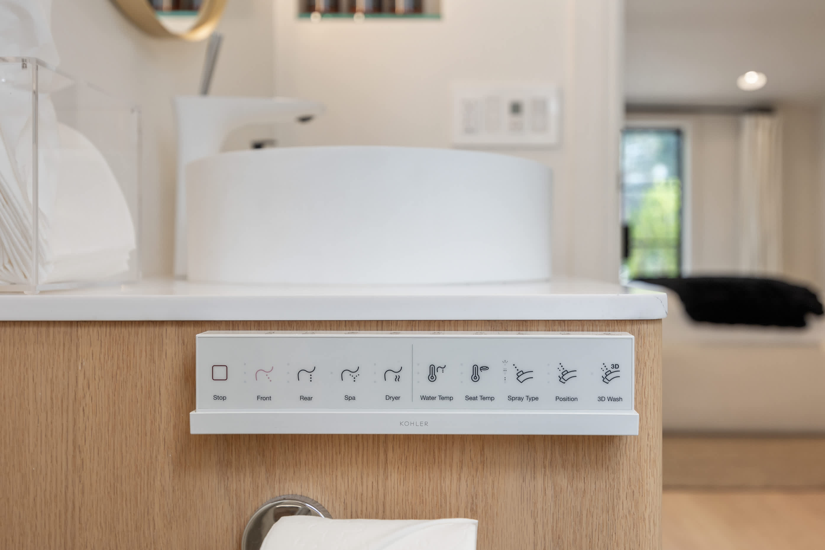 Smart toilet with advanced controls, seamlessly blending luxury and convenience.