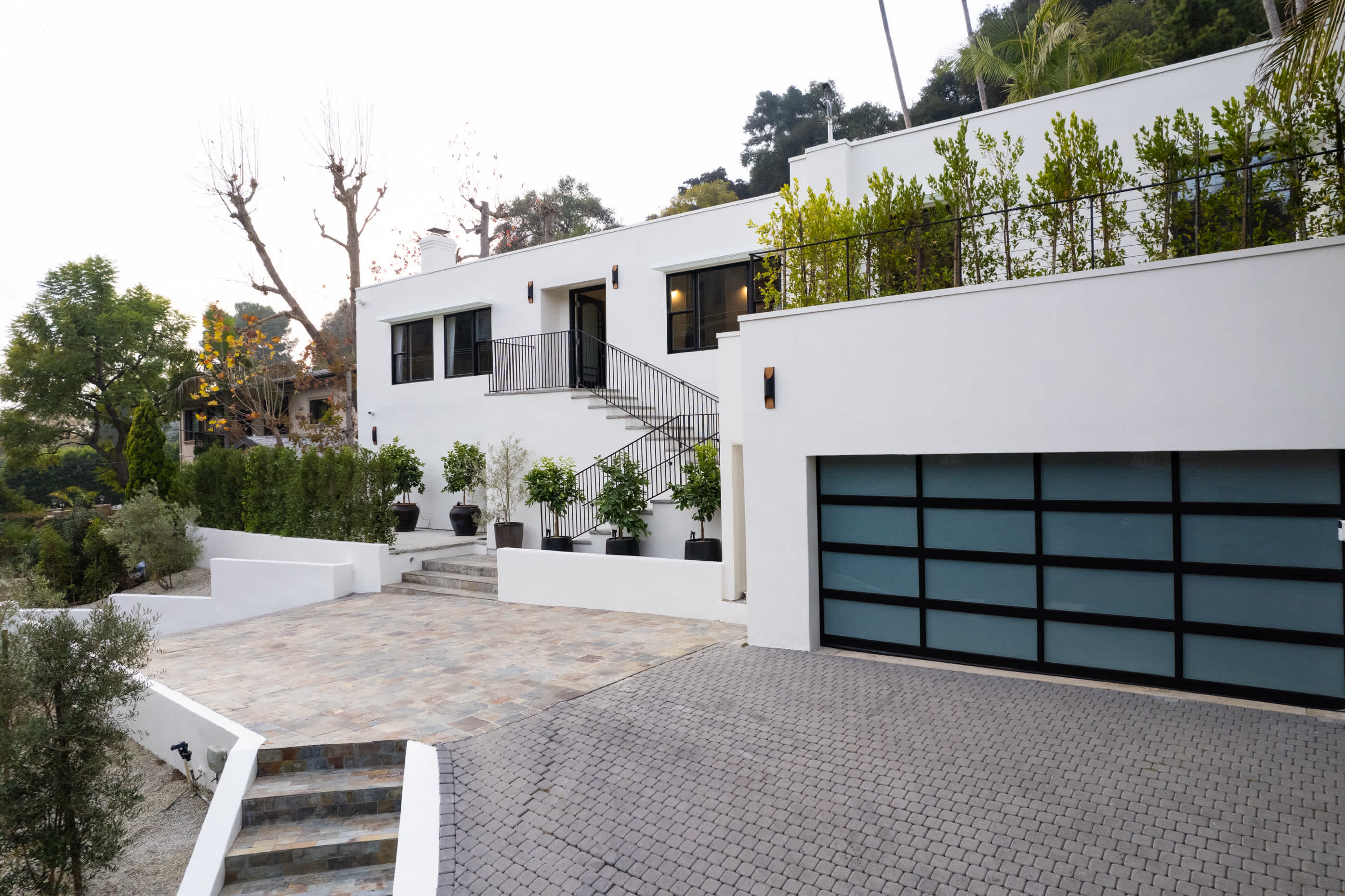 An elegant sanctuary where modern luxury meets serene hillside living.