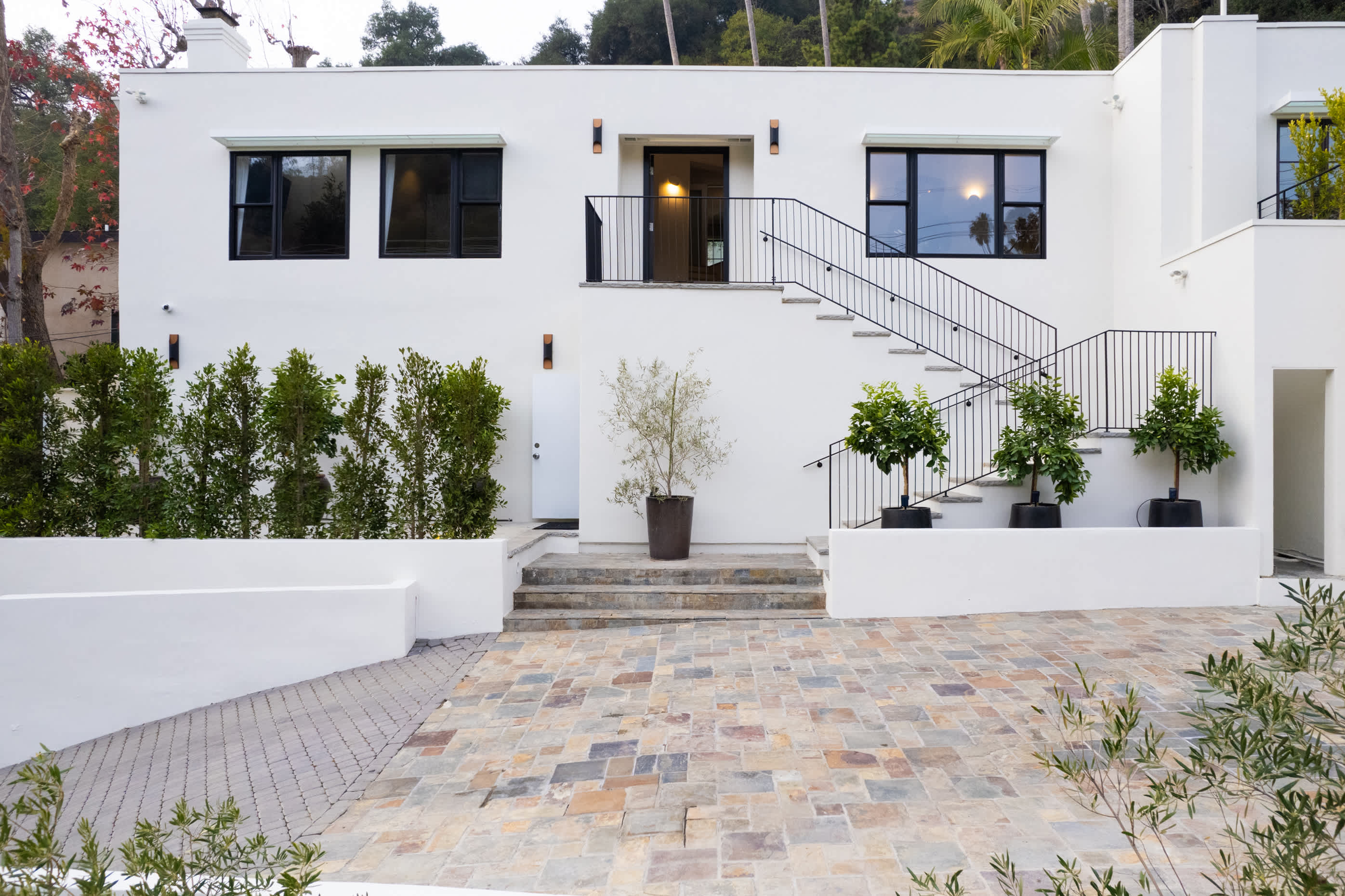 A modern masterpiece nestled in the hills, combining privacy with architectural elegance.