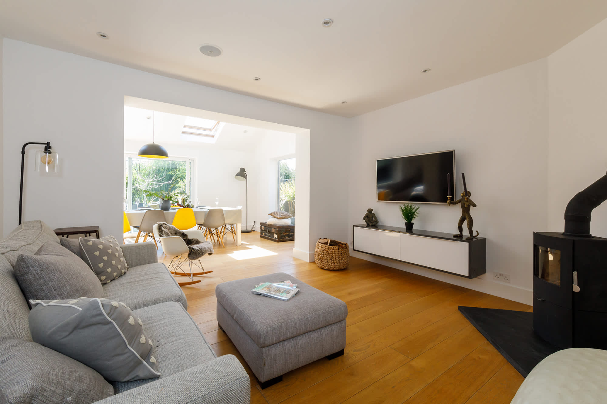 The second tv room with a Nintendo Wii and Log Burner