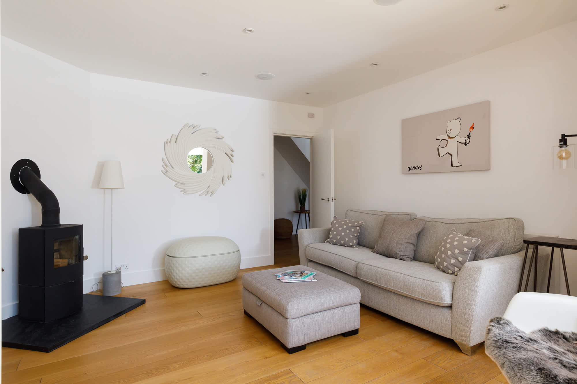 The open floor plan is more suitable for reading as you won’t be disturbed by the action in the central part of the living area