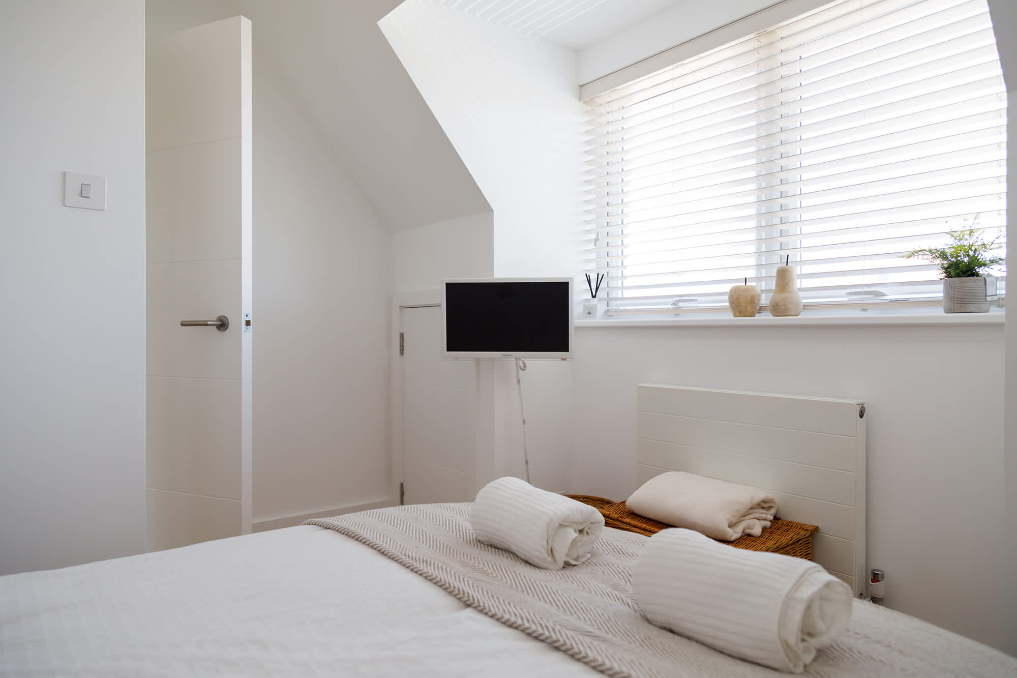 All three double bedrooms have flat-screen TVs