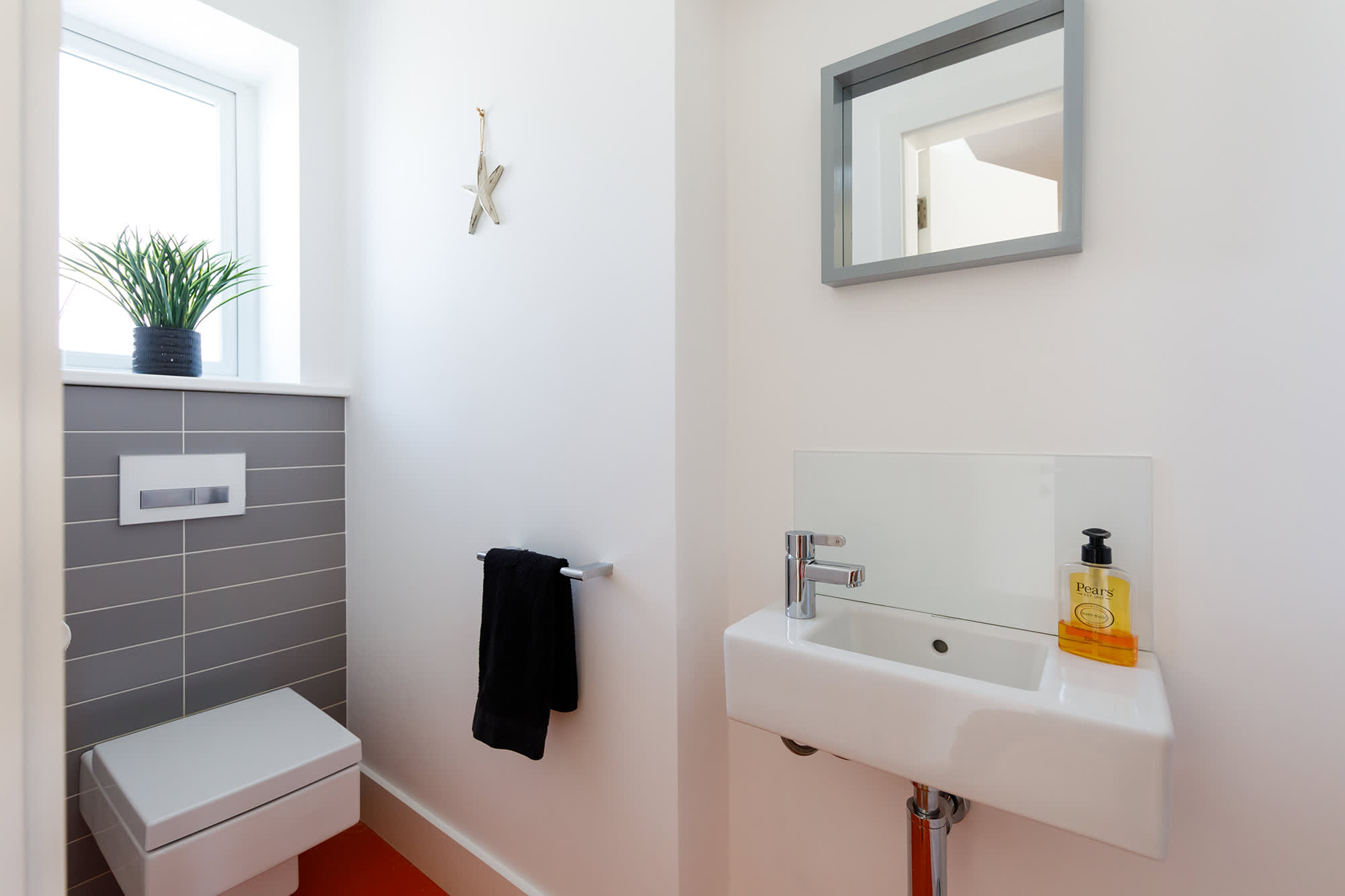 The downstairs bathroom, just across the hall from the downstairs shower room