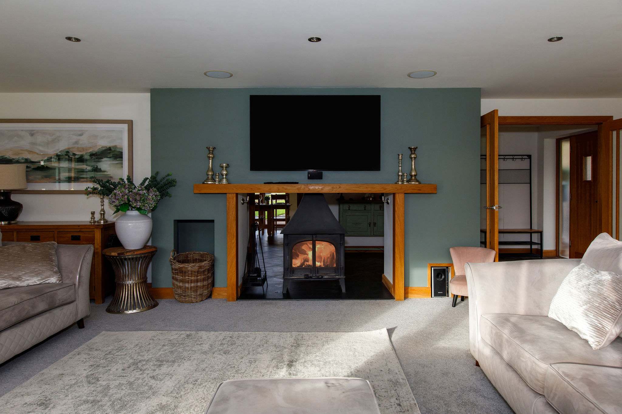 This spacious lounge has an open fireplace and Smart TV to relax & enjoy your favourite TV shows and films.