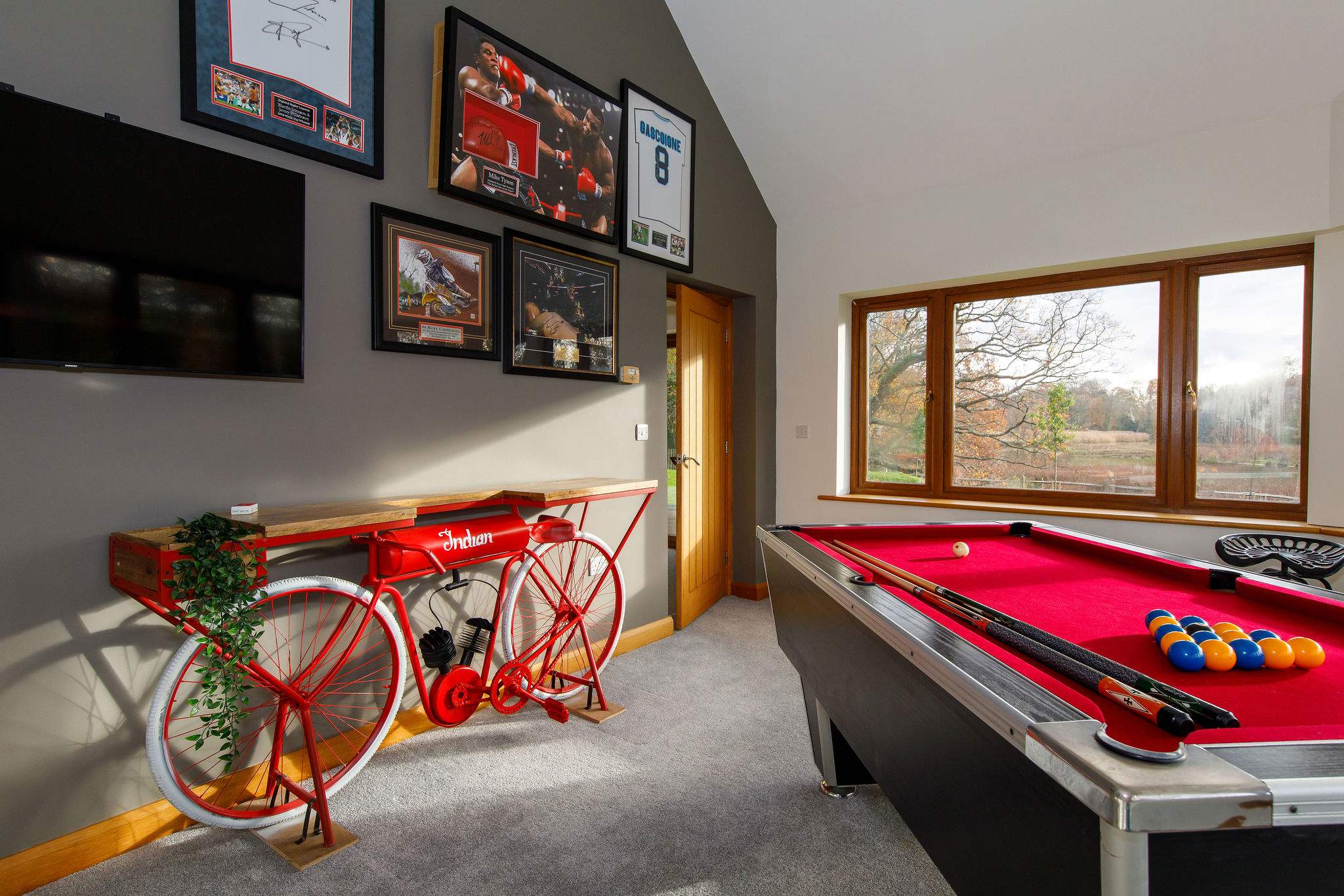 The home has an amazing games room with pool table and television overlooking the river.