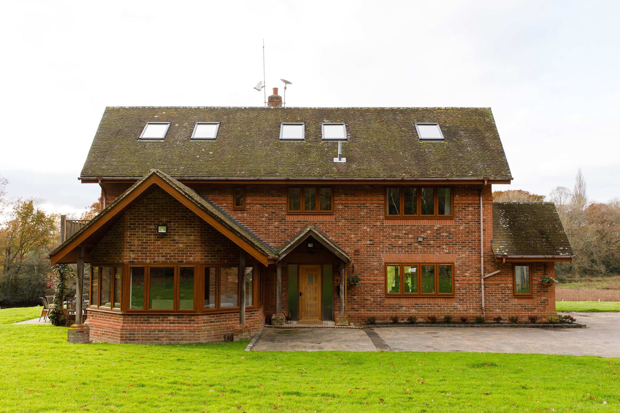 The exterior of the home, with plenty of driveway space.