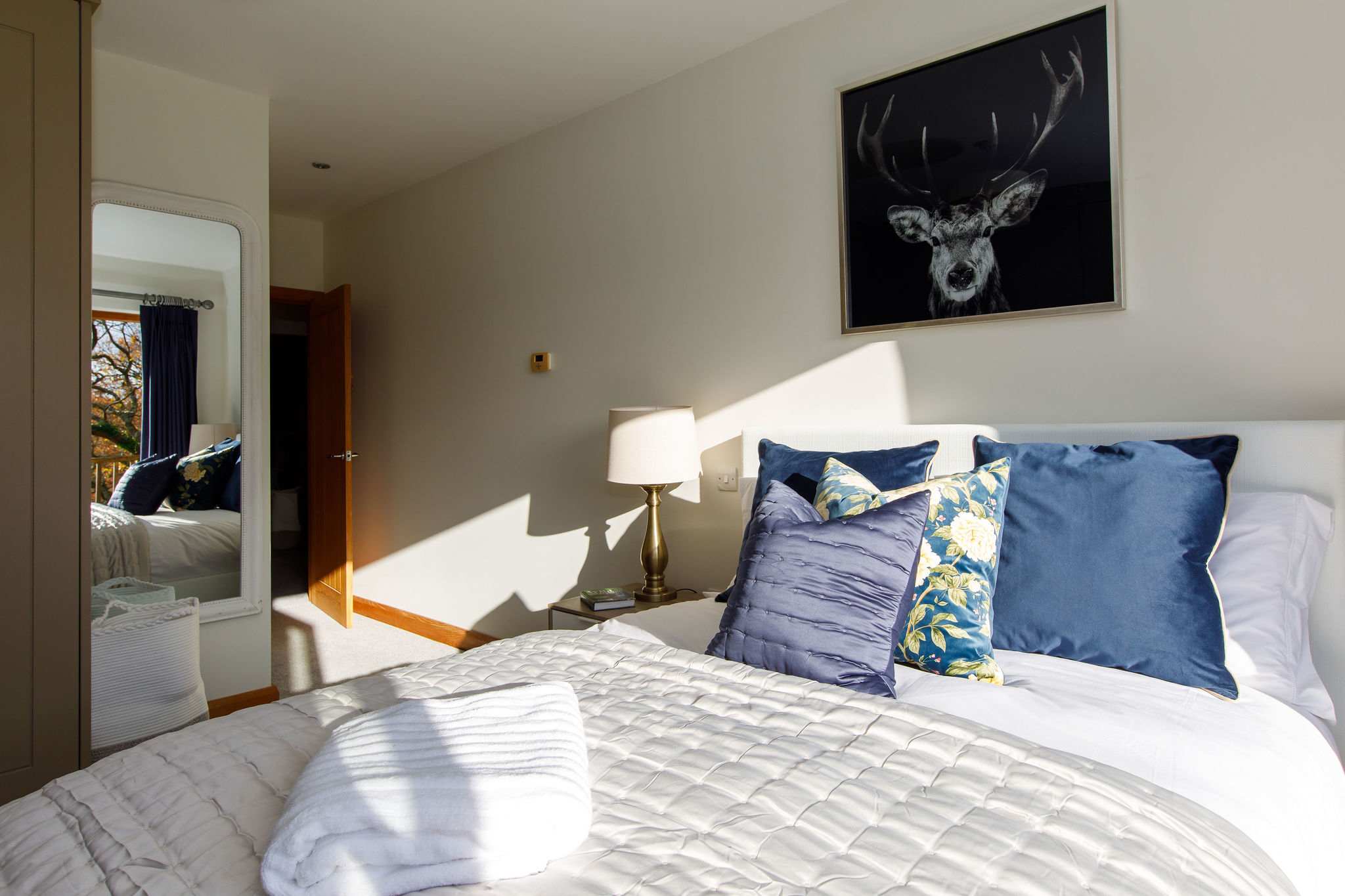 Luxury bedding and throws make a cosy night's sleep.