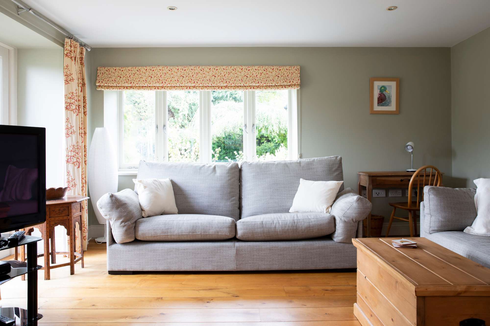 One of three 3 seater settees, more than enough space to all settle down for a movie on a wet and windy evening