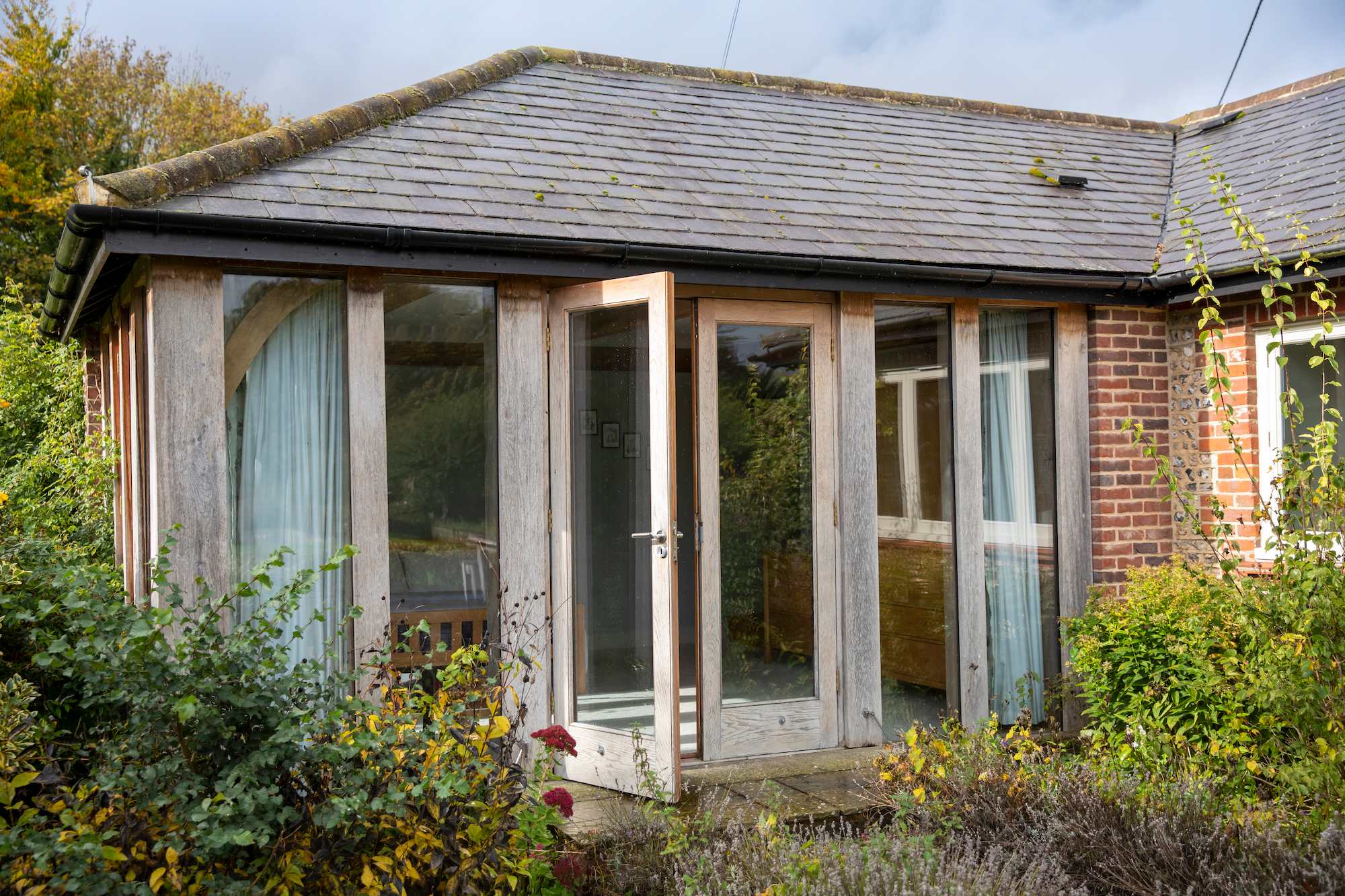 The patio doors from the master bedroom onto the gardens