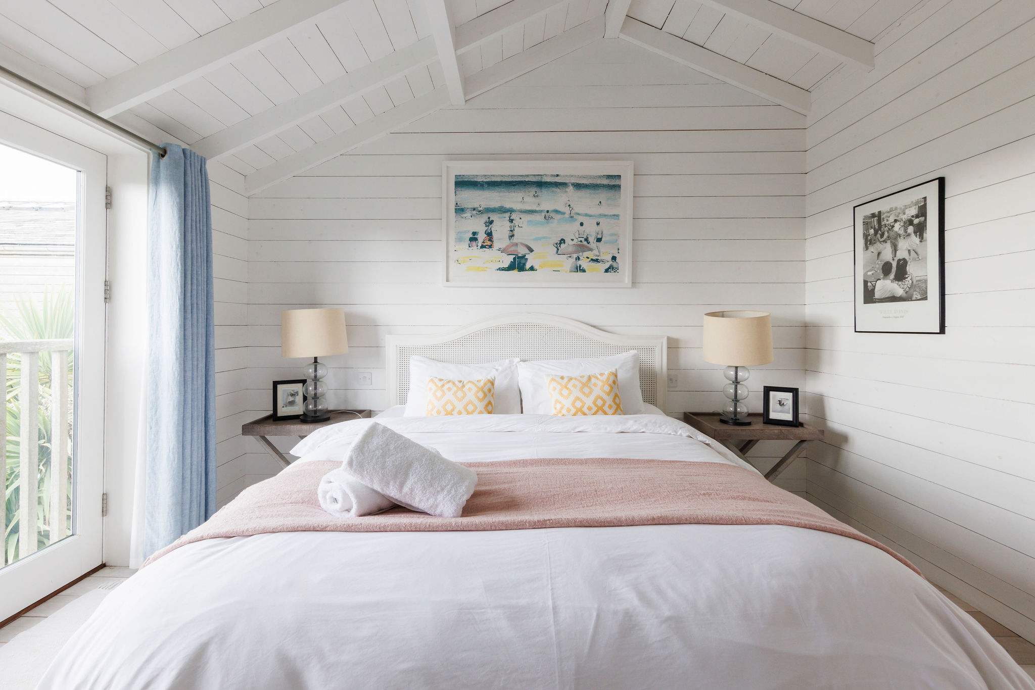Vaulted ceilings and art deco touches make this a dream master bedroom!