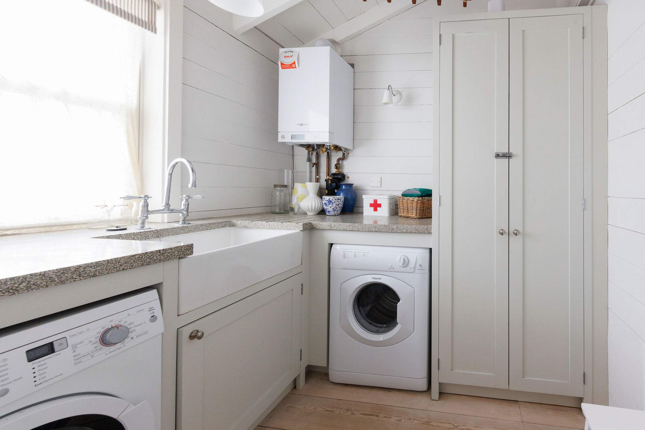 The handy utility with washer, dryer and butlers sink