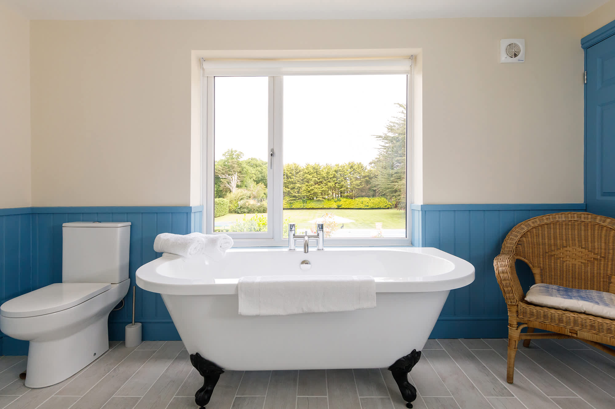 There are four beautiful bathrooms, some with garden views..