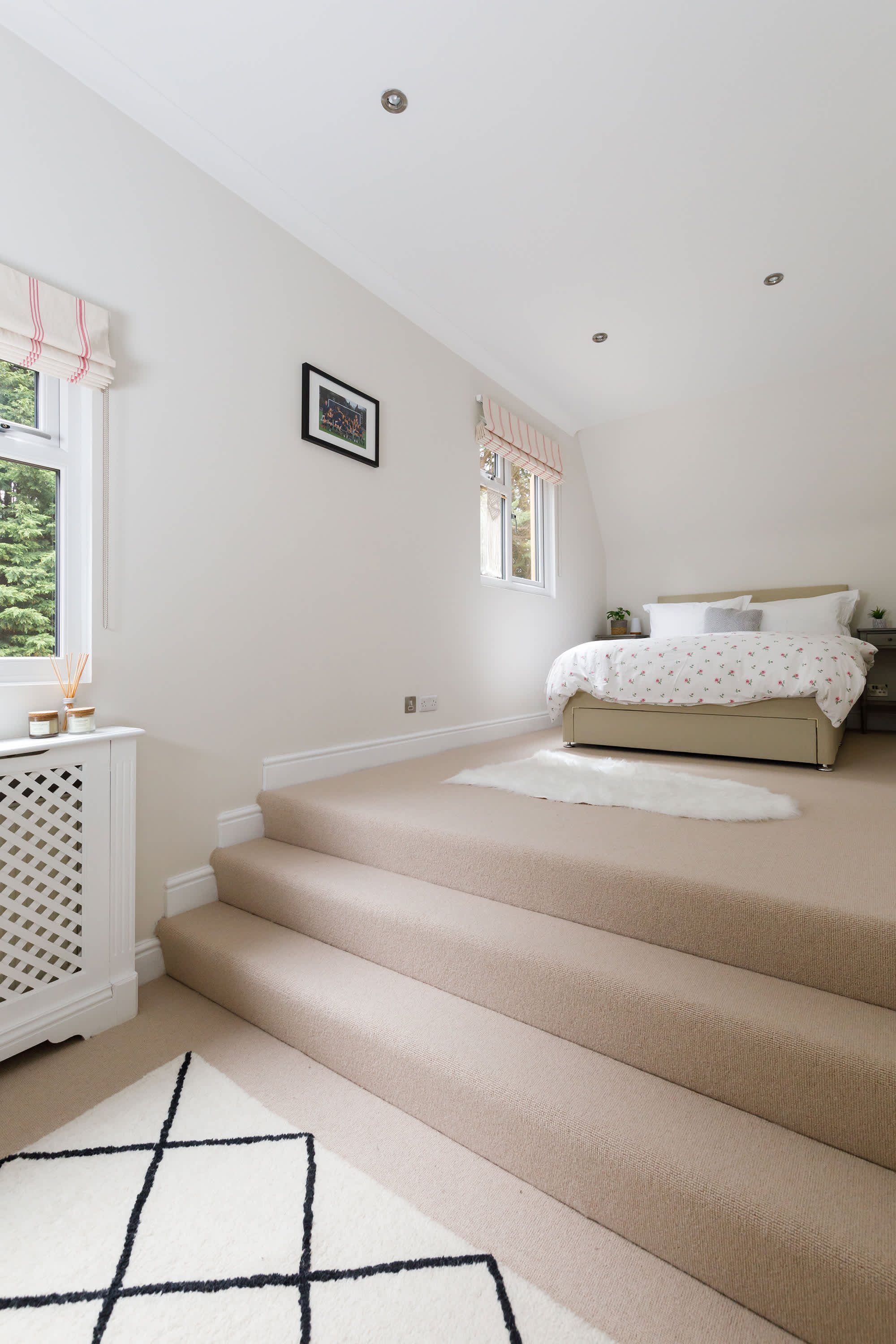 This gorgeous double room features steps up to the bed.
