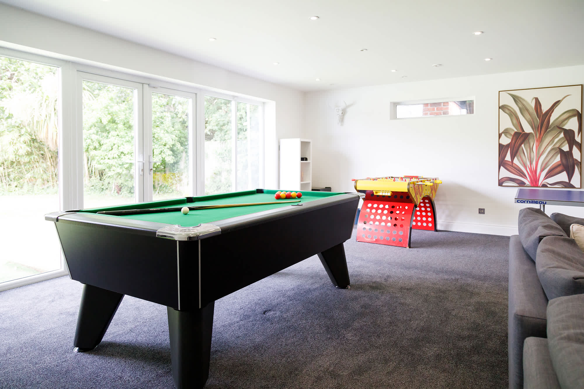 The games room has a pool table and fussball.
