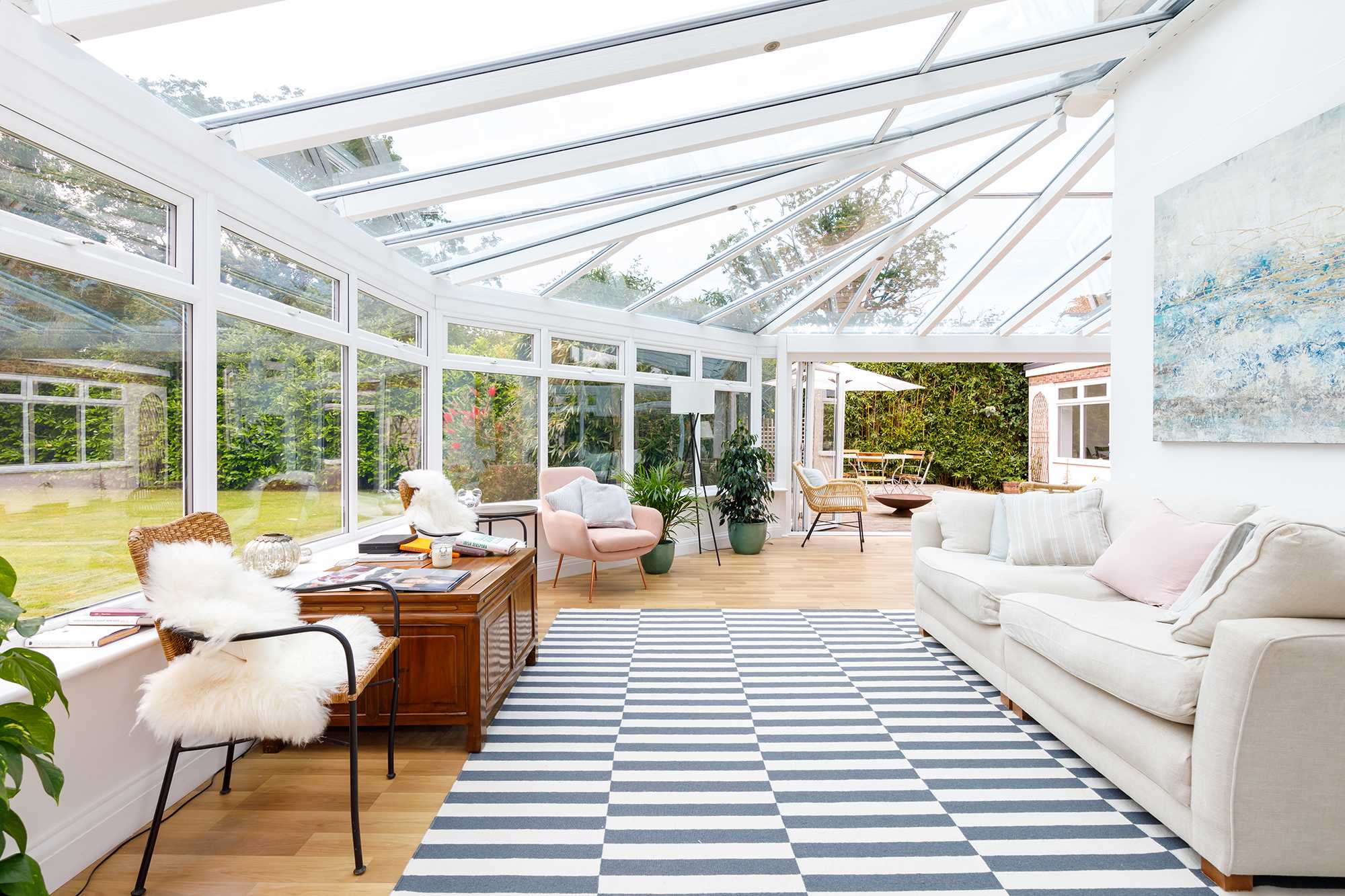 The large and sunny conservatory is a great space for morning coffee, afternoon tea or a place to relax with a good book.