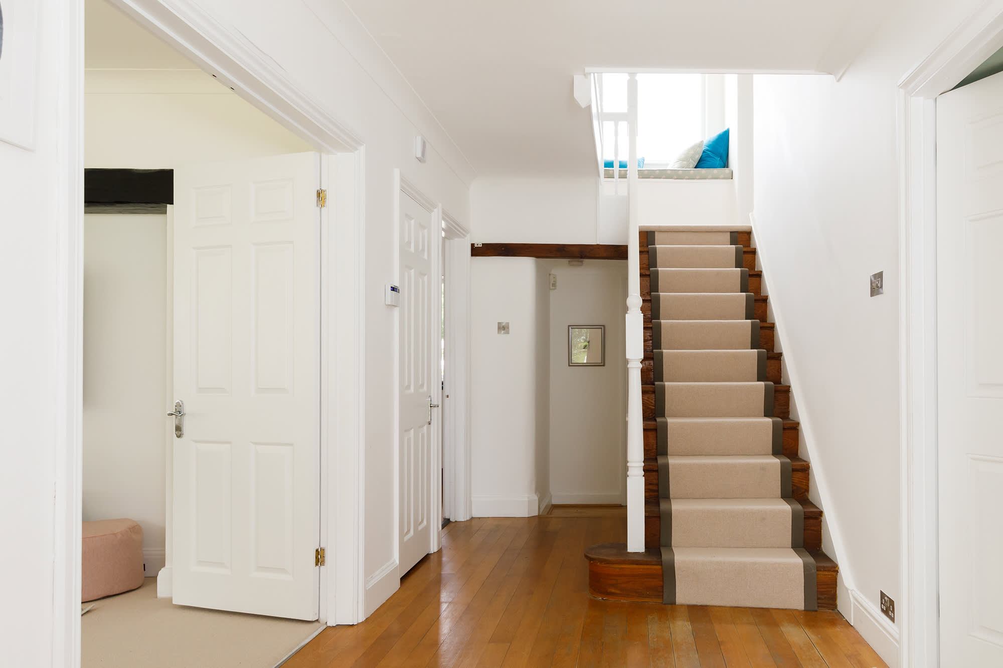 The large entrance hall and staircase leads to 5 beautiful bedrooms.