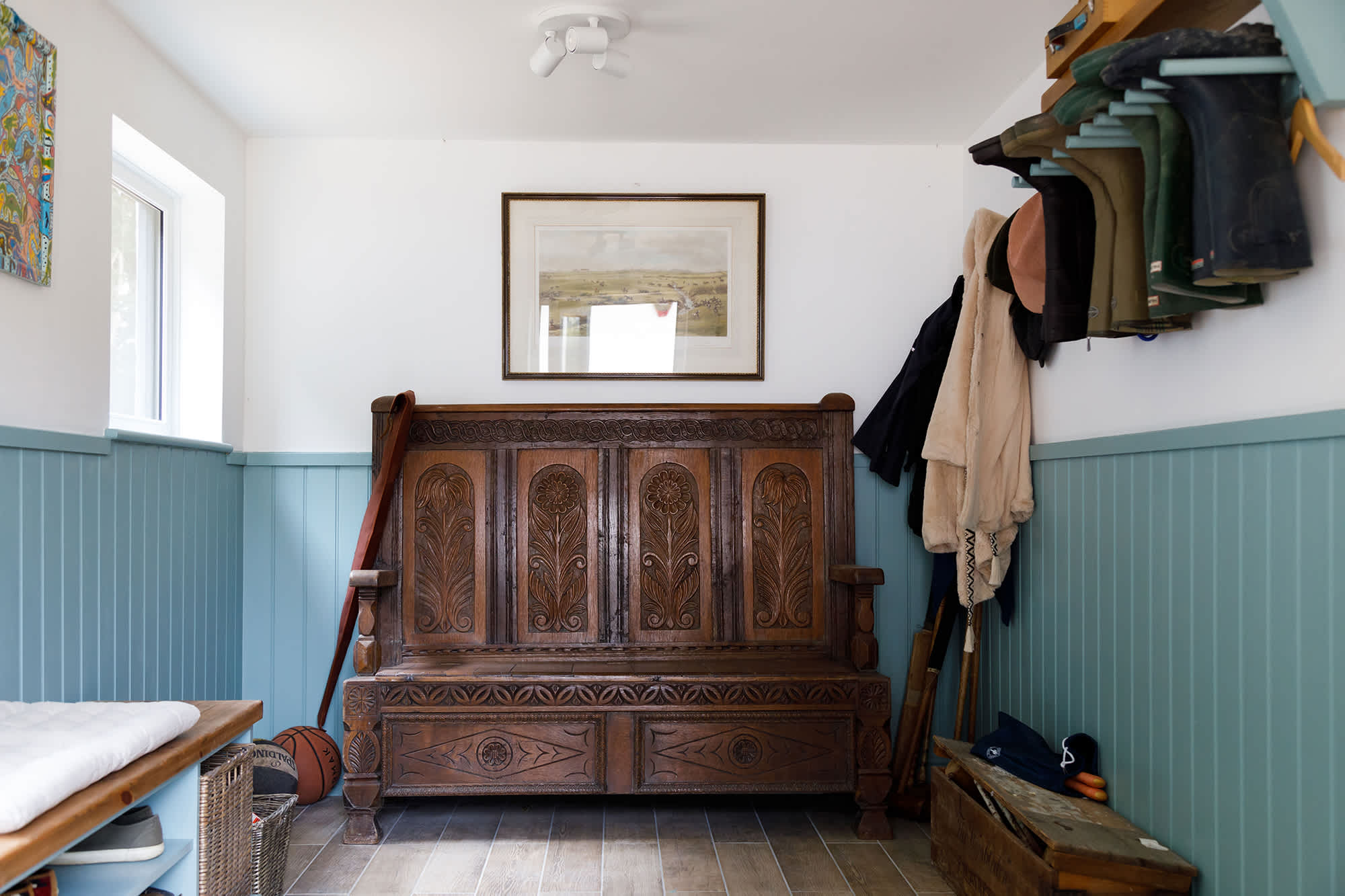 The boot room has storage for the tennis equipment and croquet.