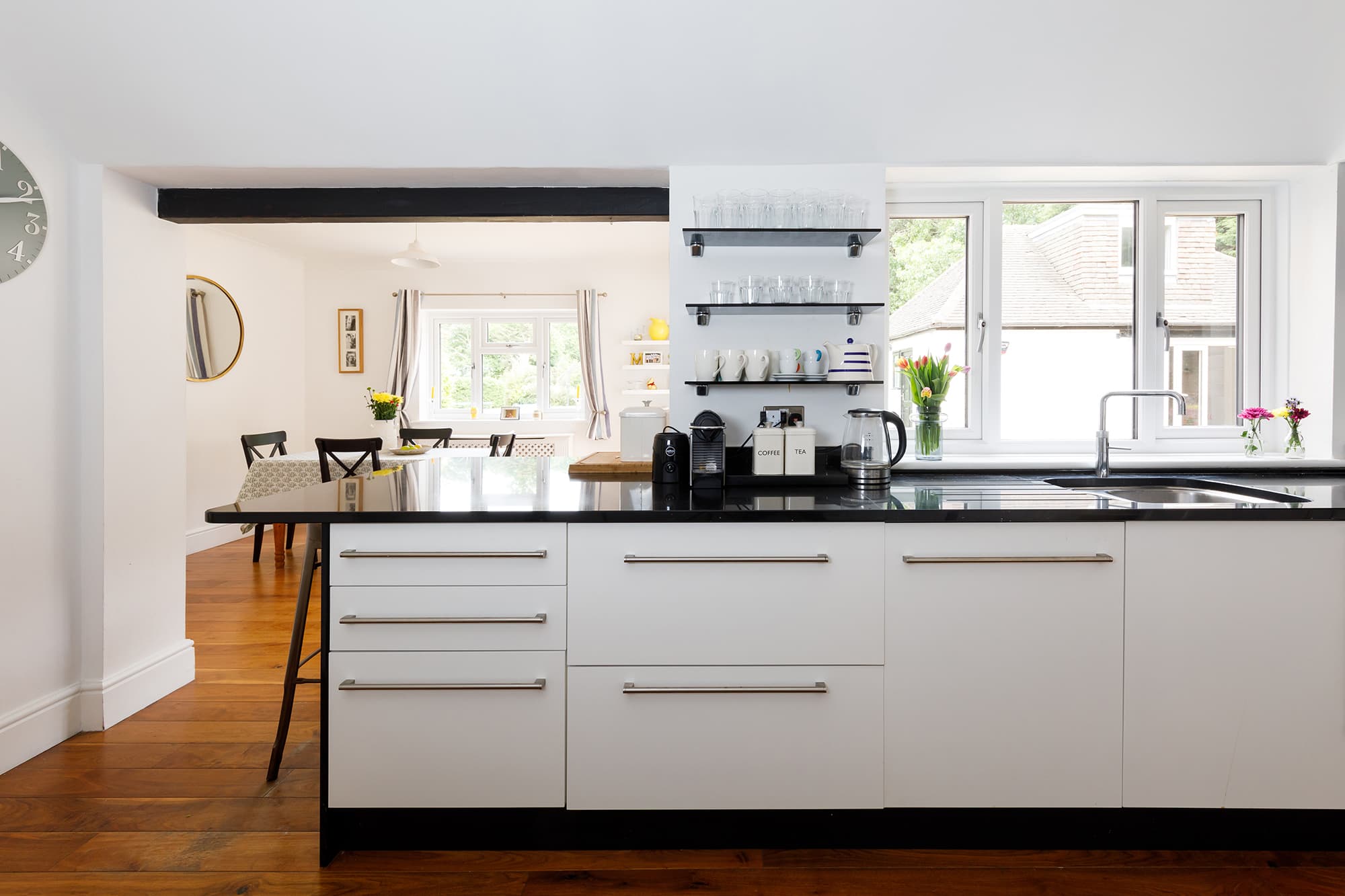 Attached to the kitchen is a pretty breakfast room.