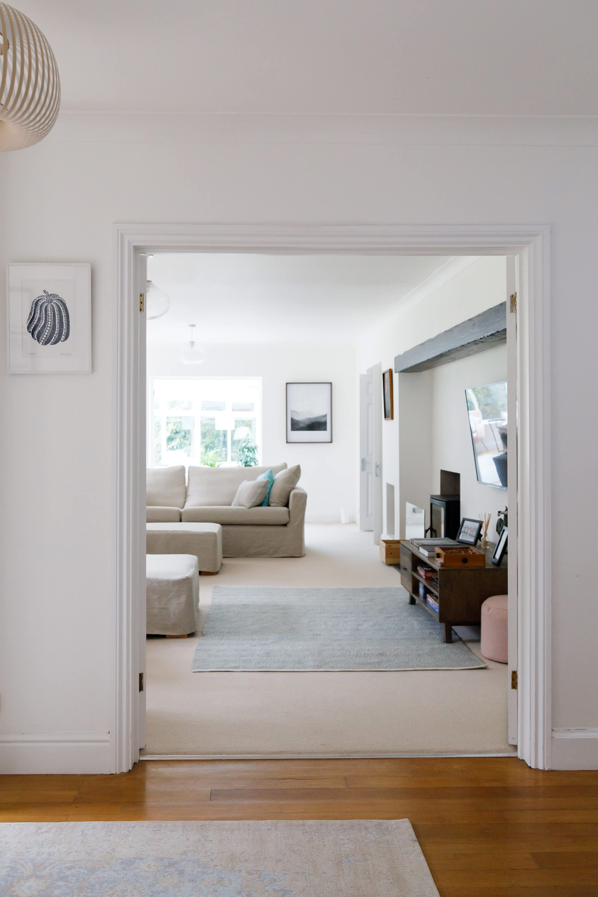 The lounge is spacious yet cosy, with deep comfy sofas and a log burner.