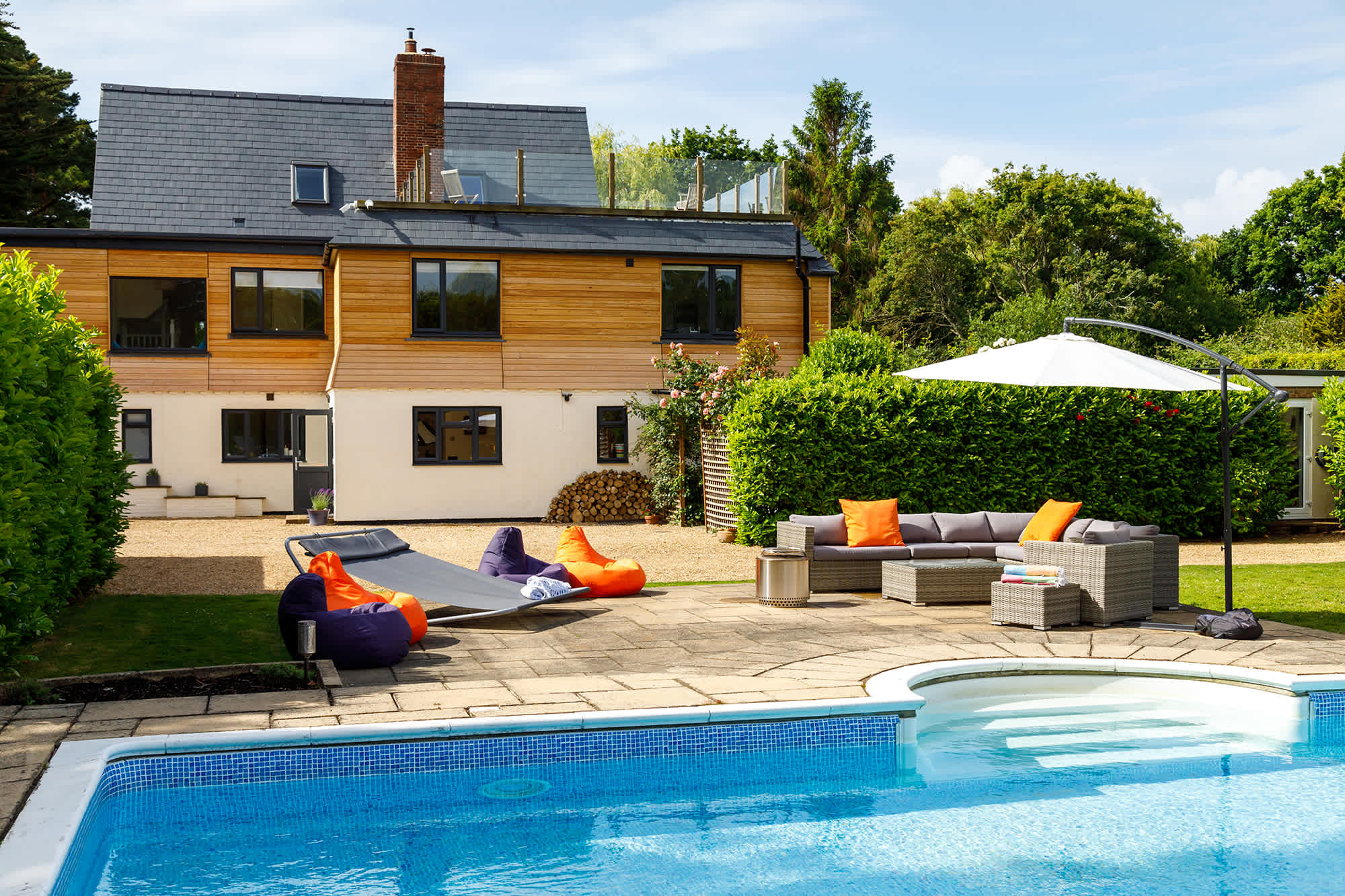 Relax by the pool on the sofas or bean bags.