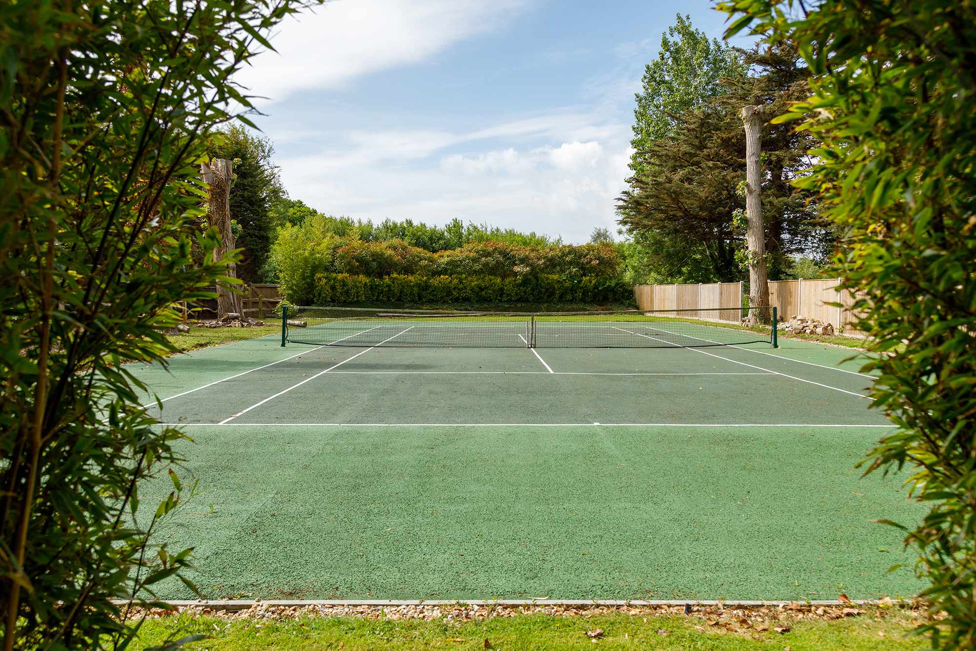 Enjoy a game of tennis anytime you fancy.