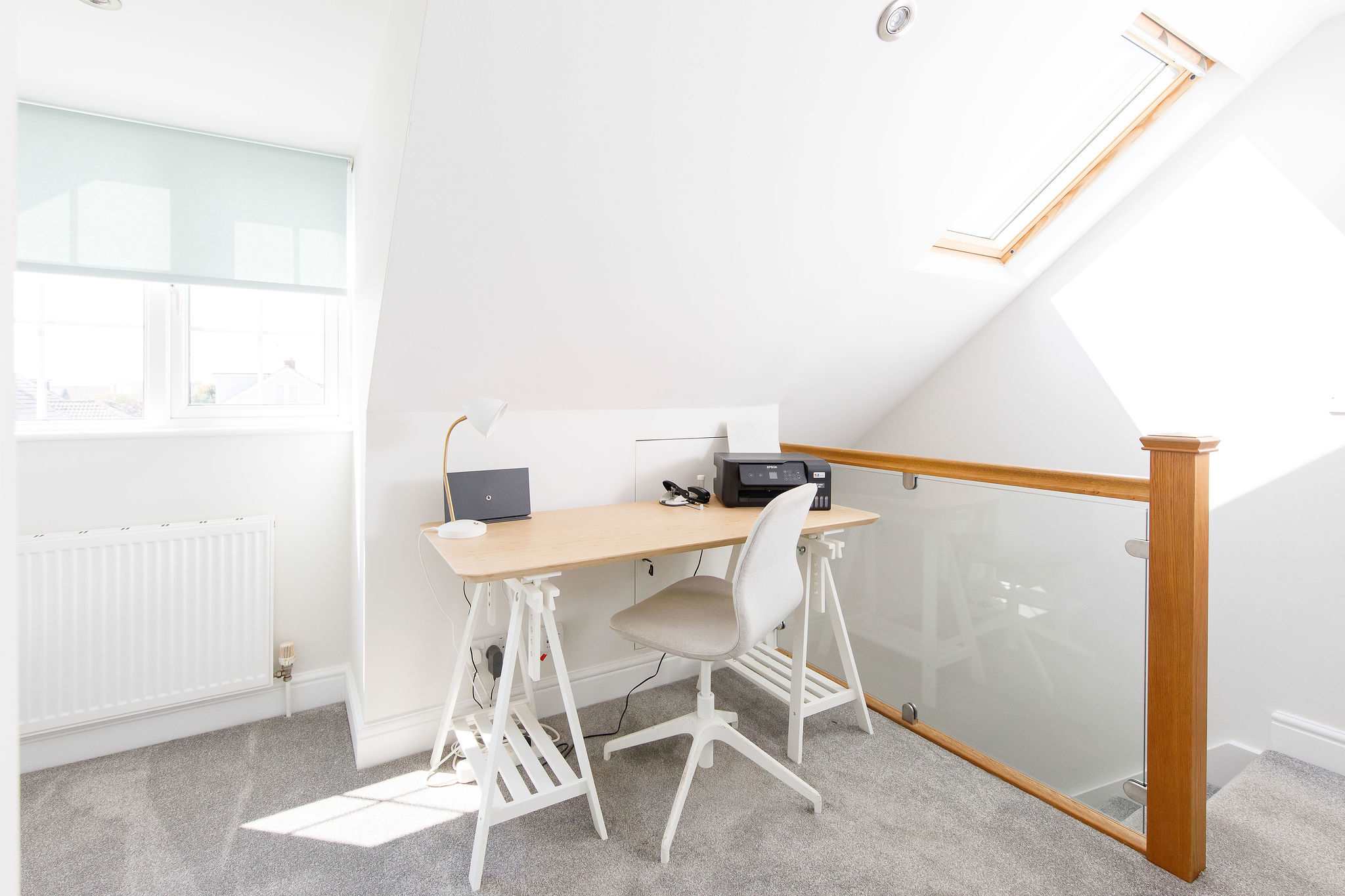 This dedicated work space on the landing is ideal for those needing to work or study remotely.