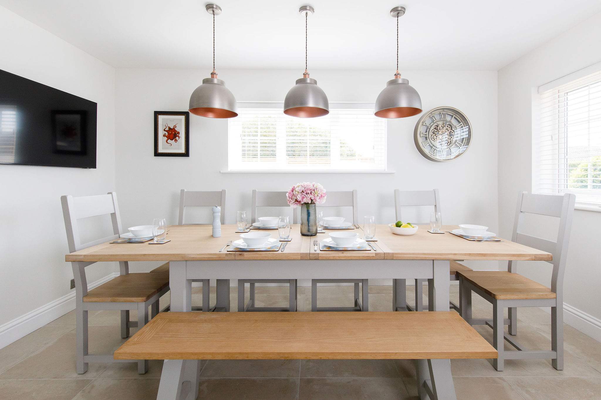 Enjoy long, leisurely meals with loved ones at the dining table (seats up to 10 guests).