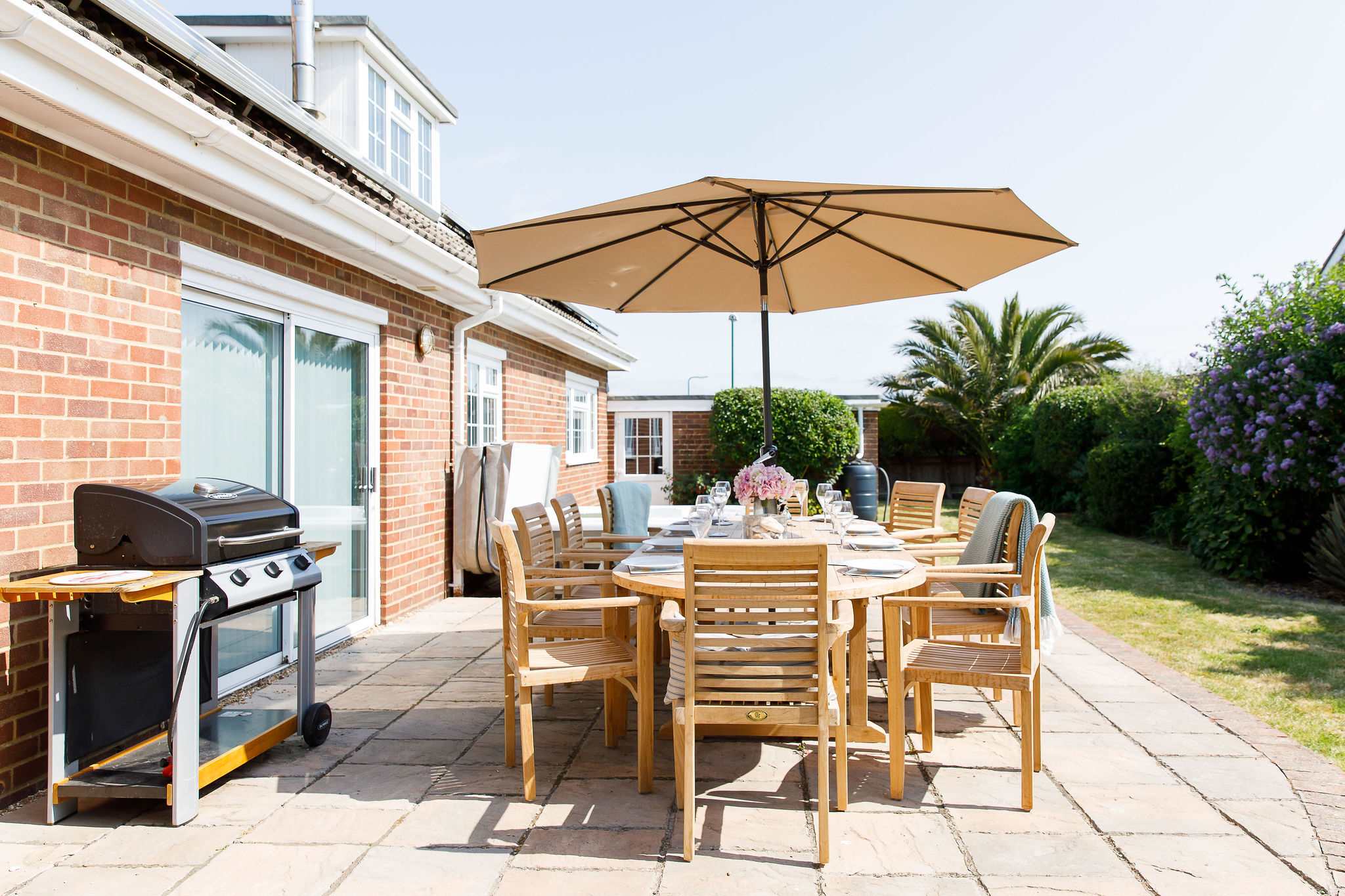 The home has a gas BBQ and dining furniture for 10.