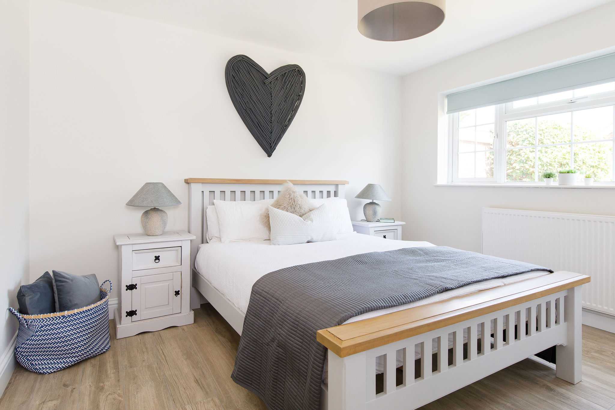 The beautifully decorated downstairs king bedroom.