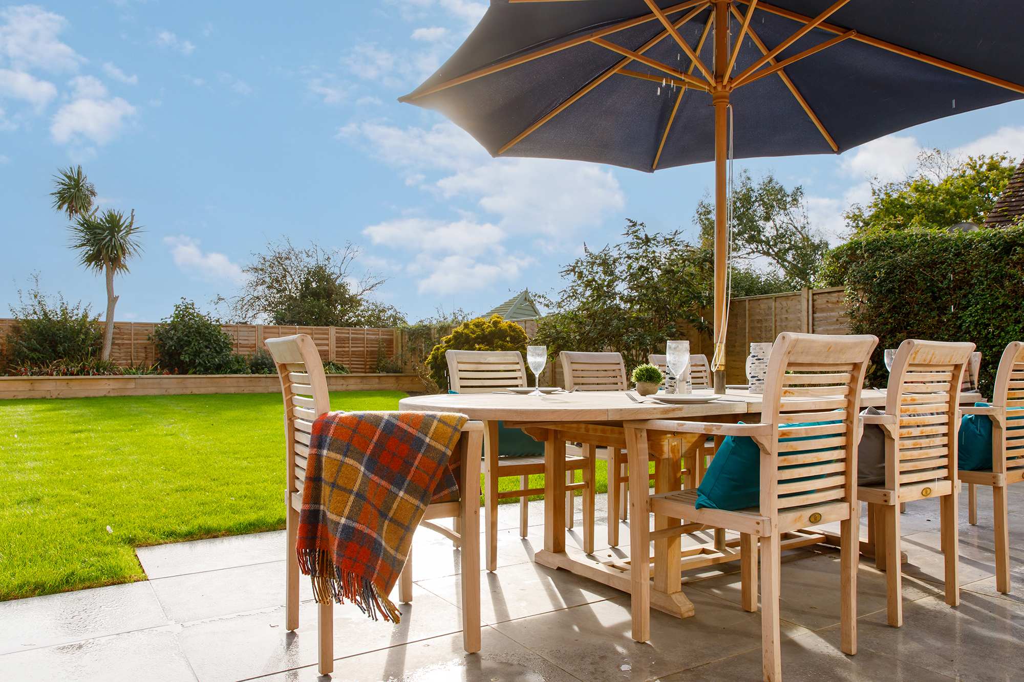 The garden has outdoor furniture for alfresco dining, drinks and relaxing.