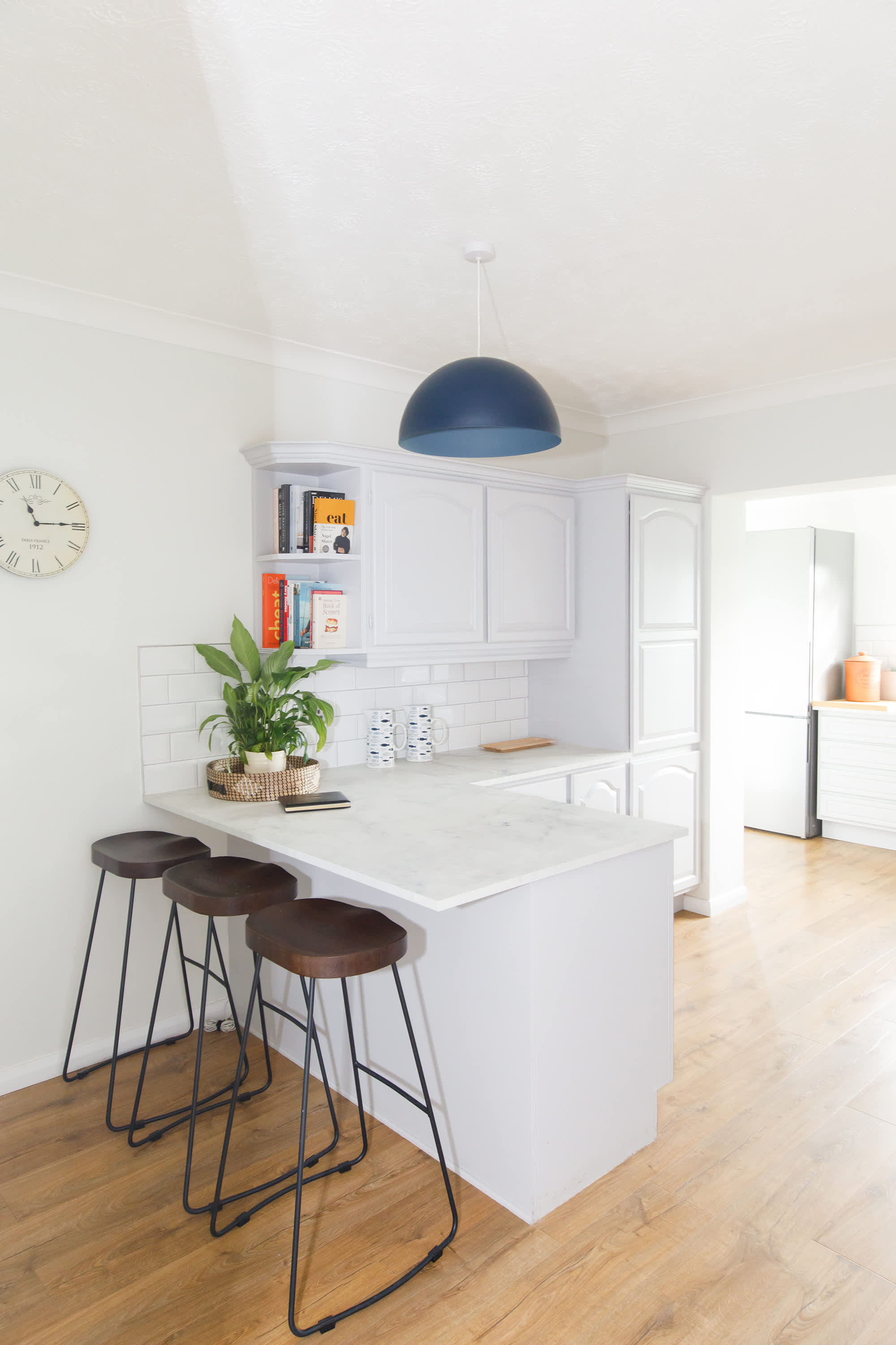 Enjoy a morning coffee at the breakfast bar in the kitchen.