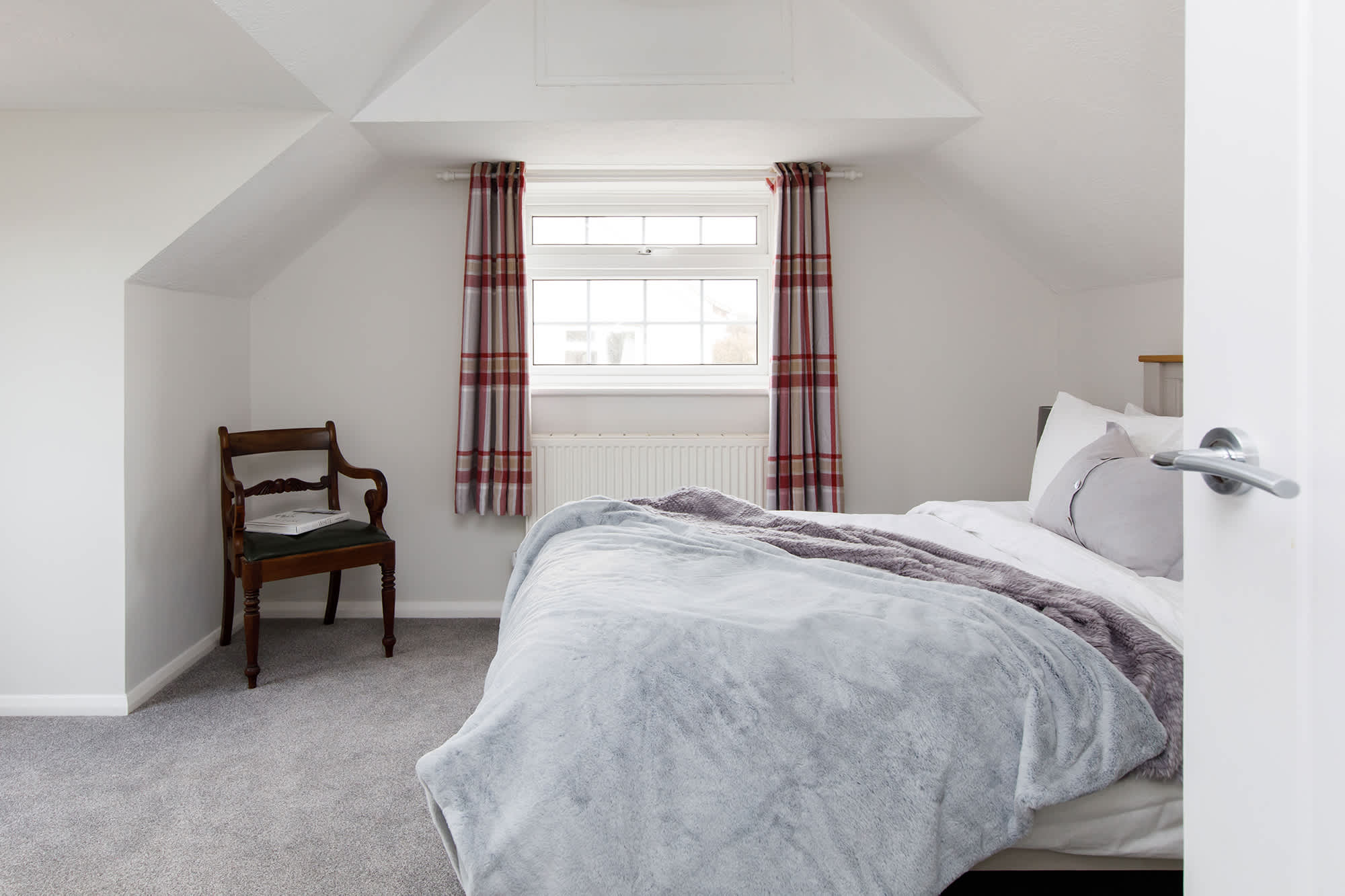 The second upstairs king room is light and spacious.