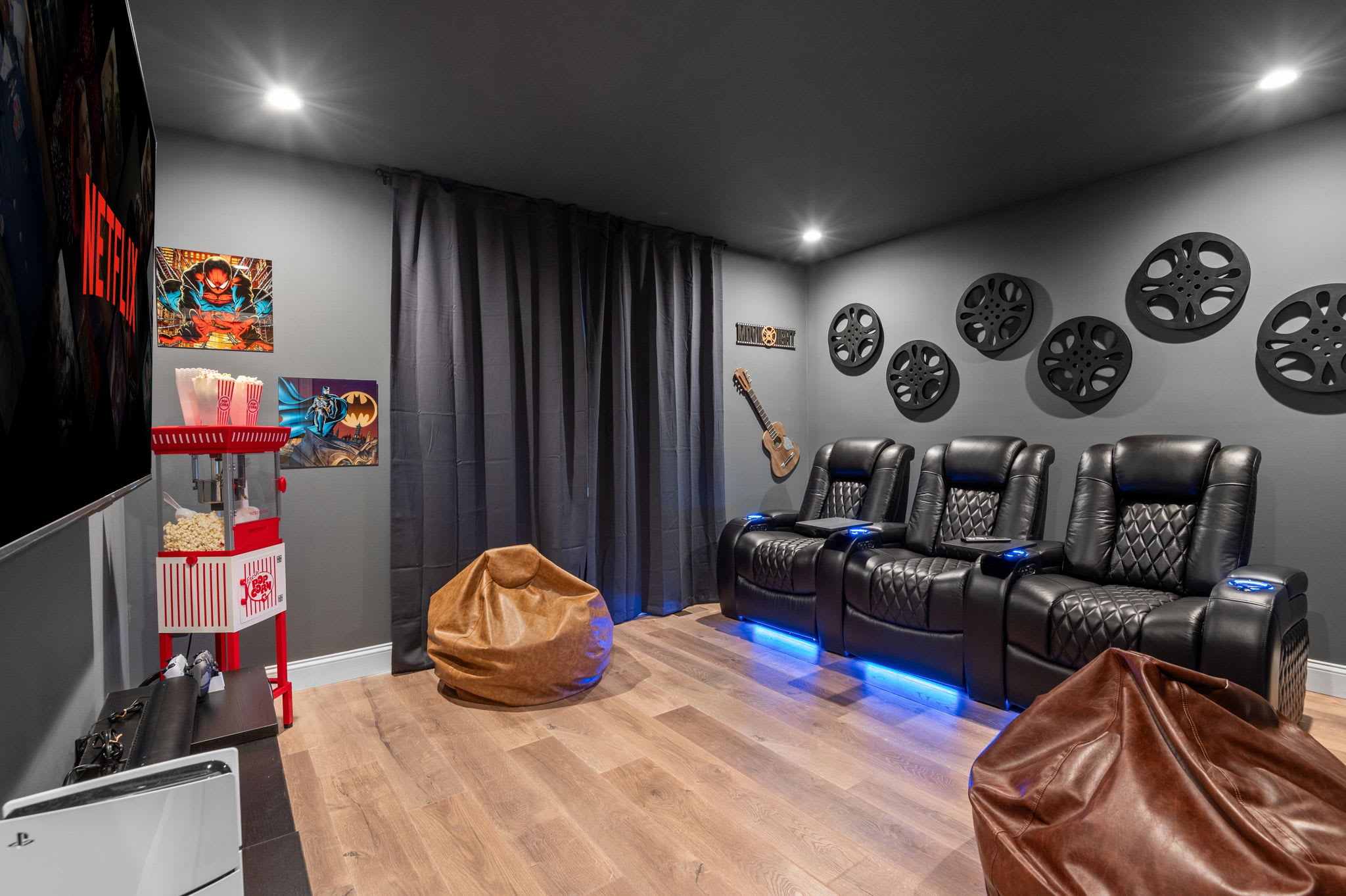 Sit back in plush reclining chairs with LED lighting and enjoy a true home theater experience. Grab some popcorn and let the movie night begin!