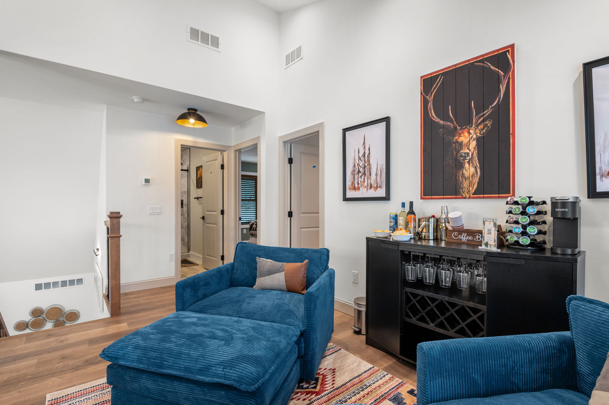 From another angle, the lounge seamlessly connects to the rest of the home, allowing light and conversation to flow effortlessly.