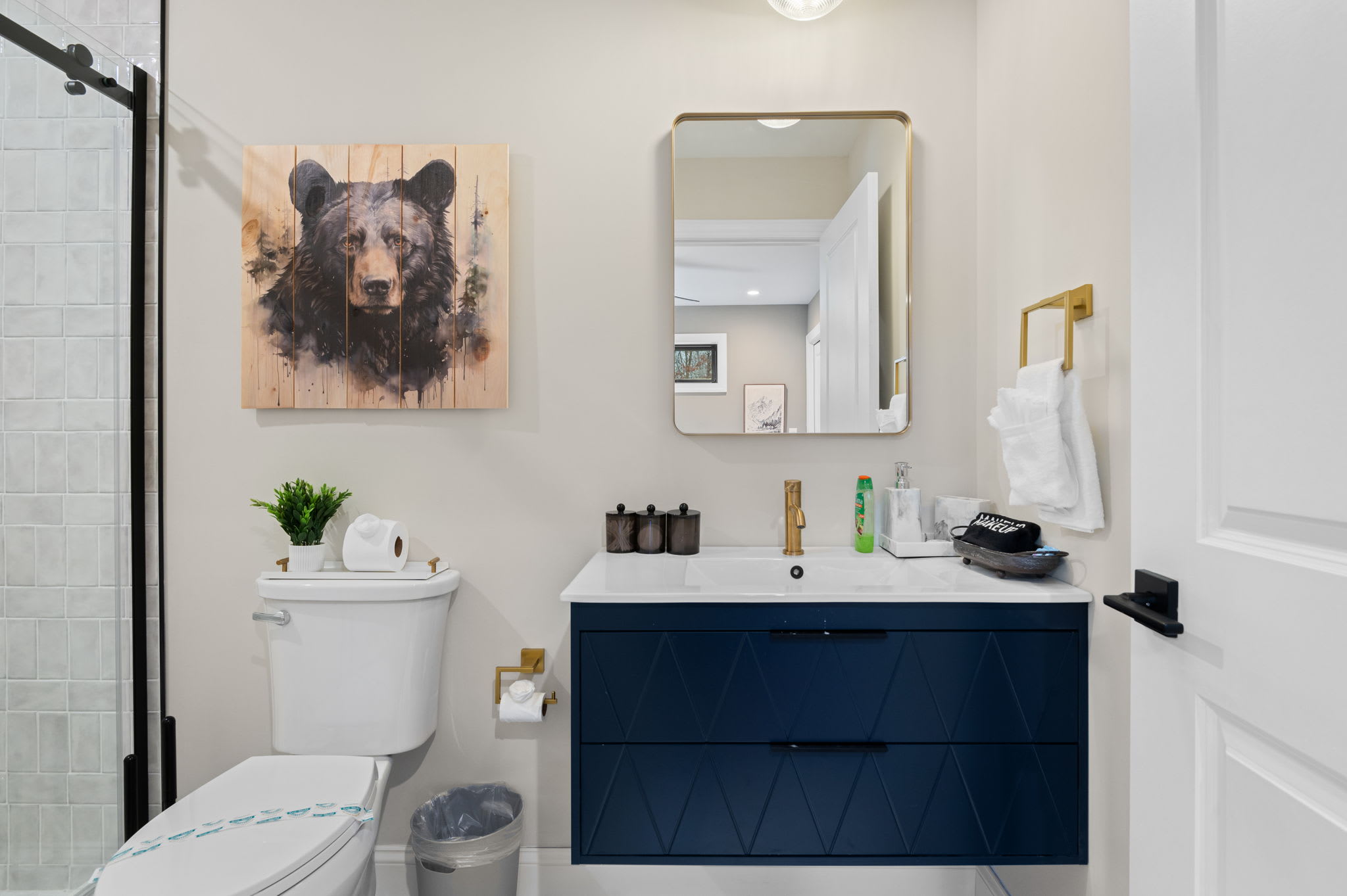 Clean lines and stylish finishes tie this bathroom together, offering both comfort and a touch of mountain charm.