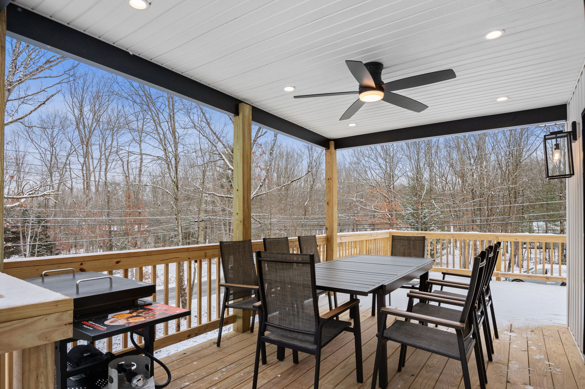 Enjoy meals alfresco with a fully equipped grill, a large dining table, and stunning views, perfect for family cookouts or cozy dinners.