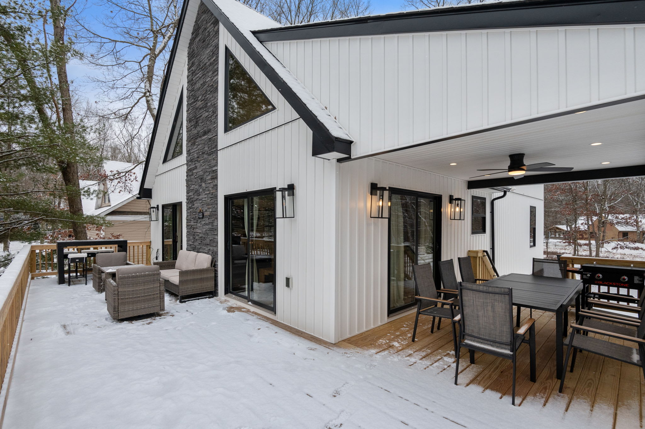 With multiple lounge areas, this deck is perfect for morning coffee, outdoor dining, or just soaking in the peaceful surroundings.