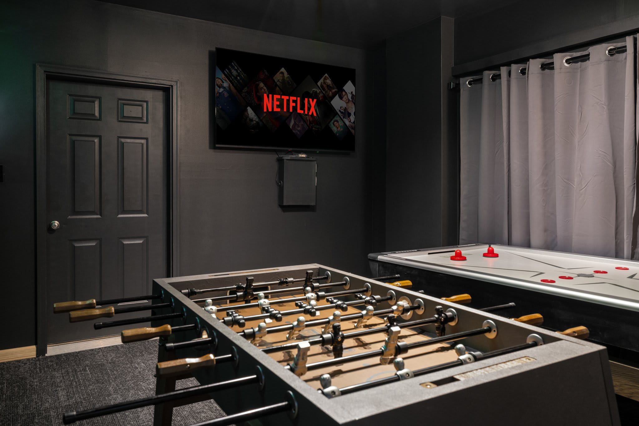Foosball, air hockey, and Netflix on standby, this room has something for everyone.