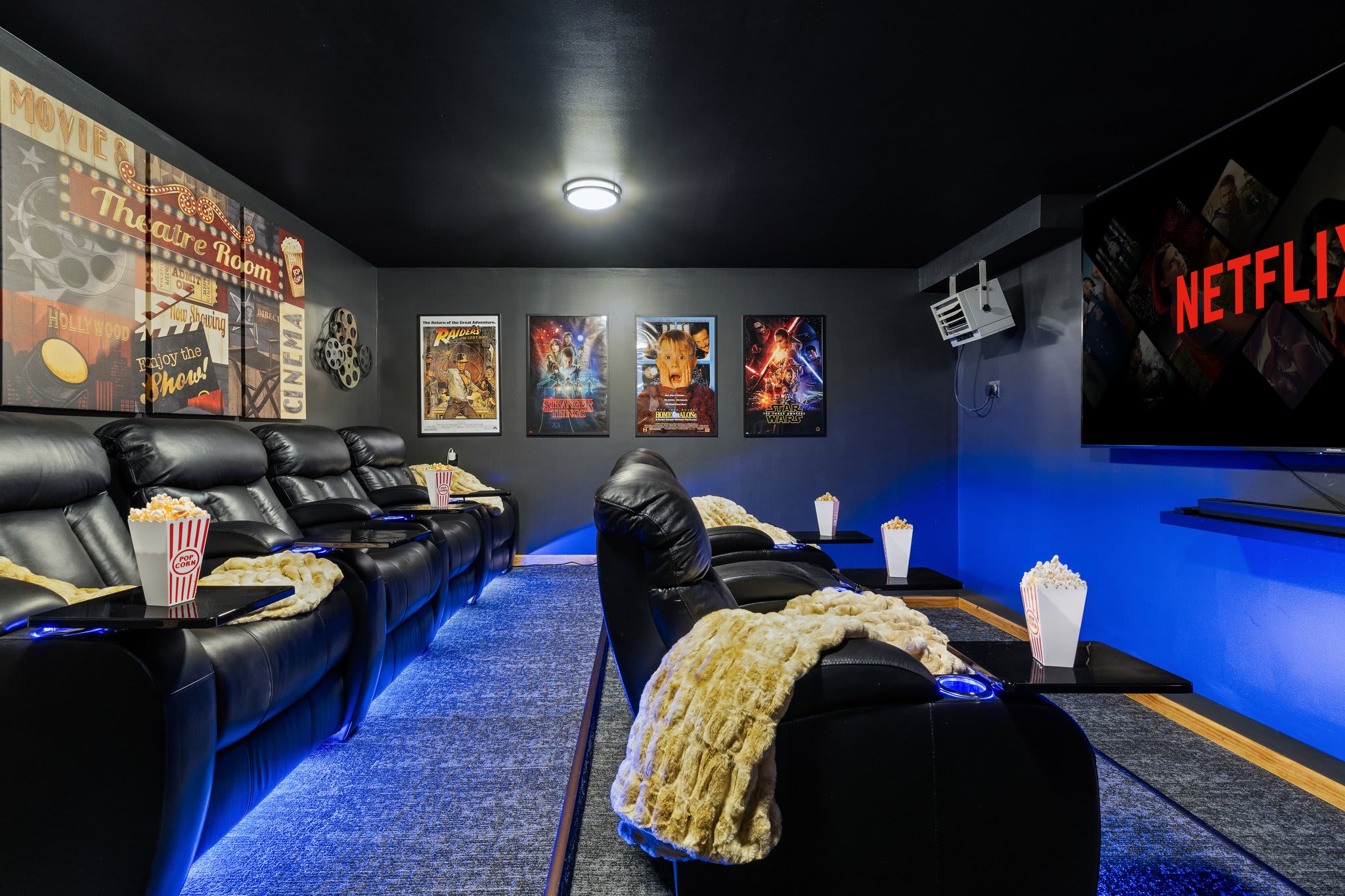 Private Theater Magic
Your own in-house movie theater, complete with recliners, blankets, and popcorn-ready vibes.
