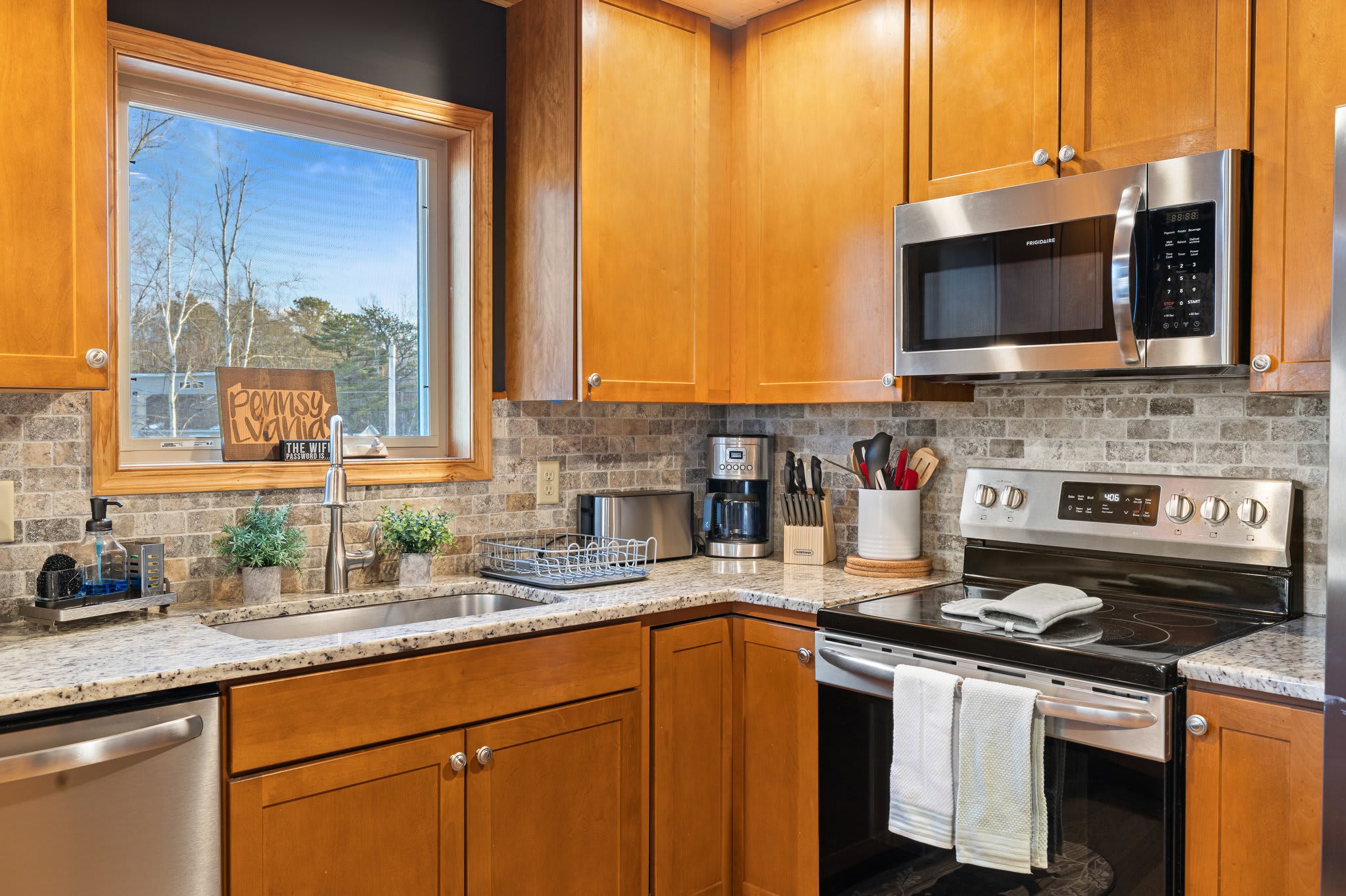This kitchen doesn’t just cook, it inspires. Watch the trees sway while your morning coffee brews.