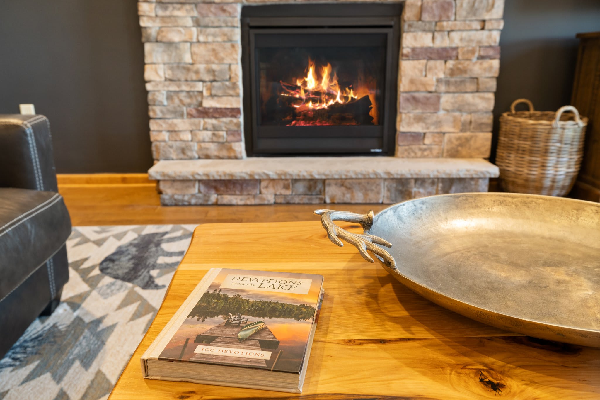 Whether you're flipping through a book or just watching the flames dance, this coffee table is made for lingering.