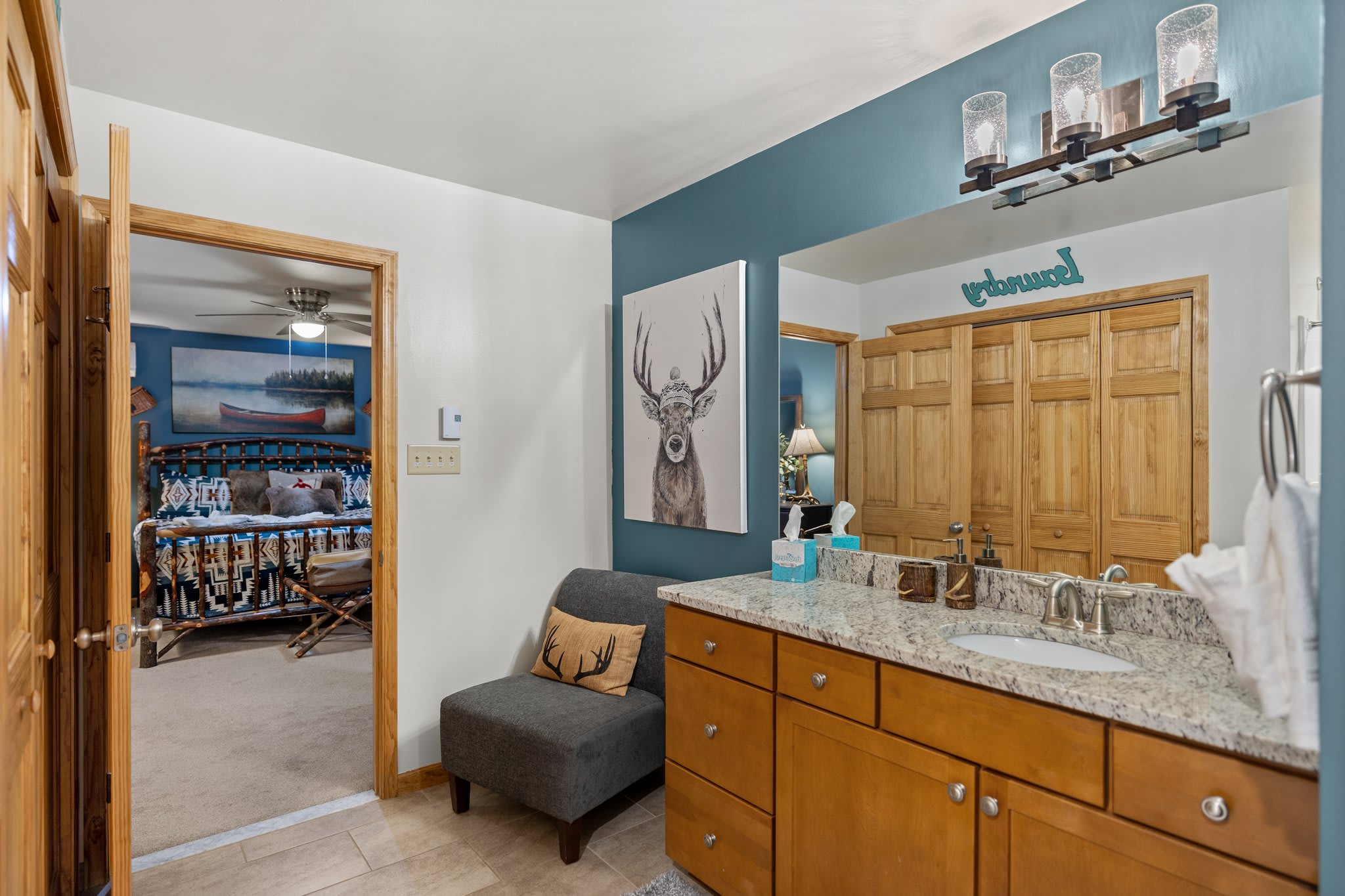 This ensuite bath is spacious and bright, with a sink setup so no one has to wait their turn.