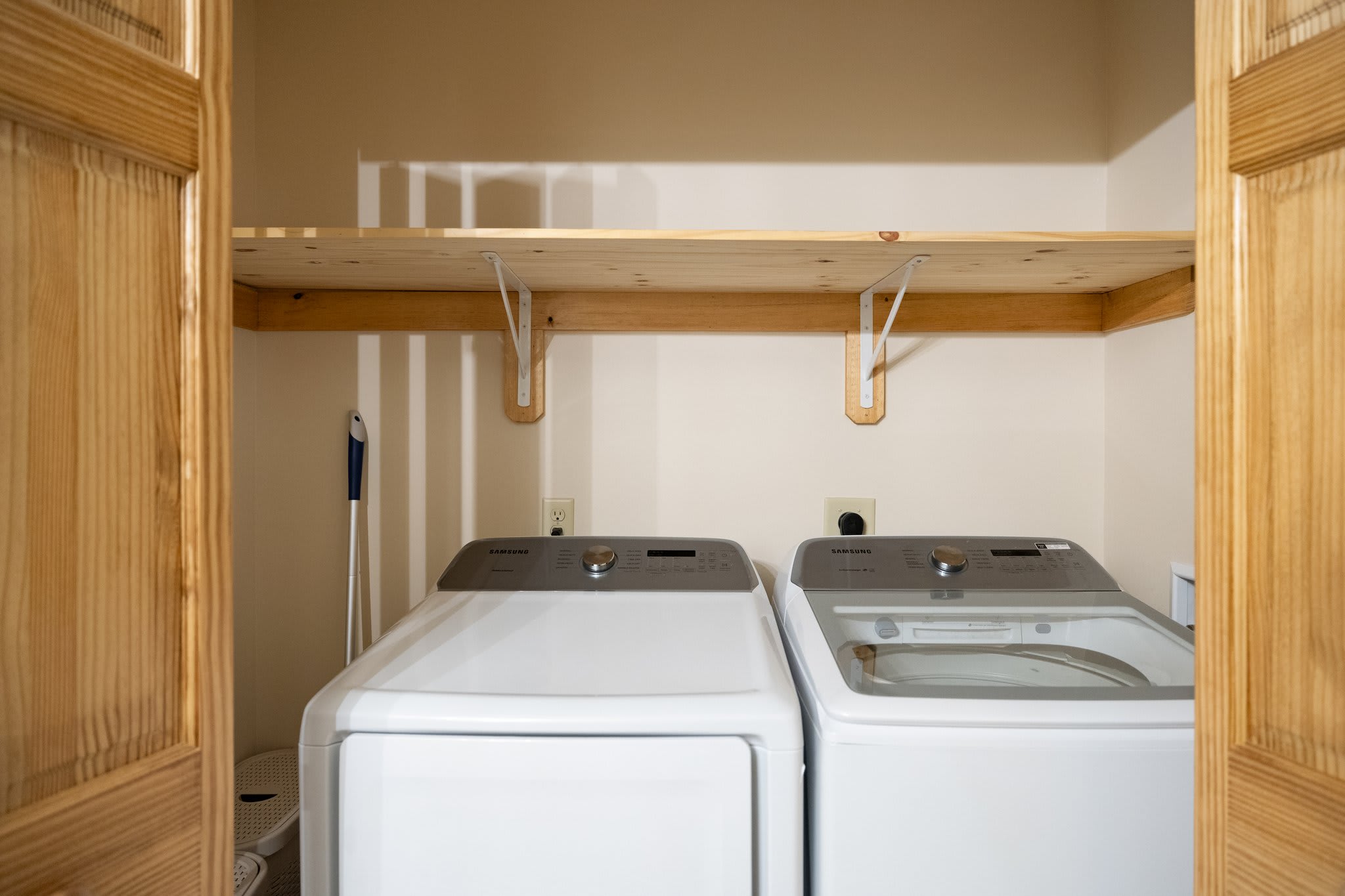 Washer and dryer behind bi-fold doors, super convenient, especially for longer stays.