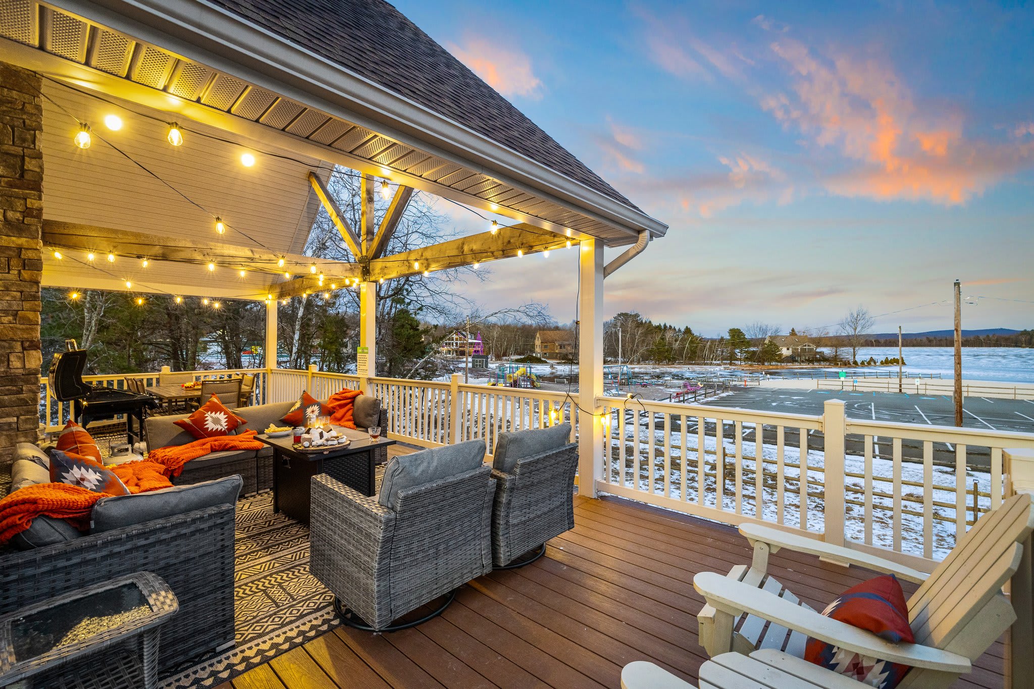 Outdoor sofa seating and a glider swing make this the perfect place to watch the sky change colors.